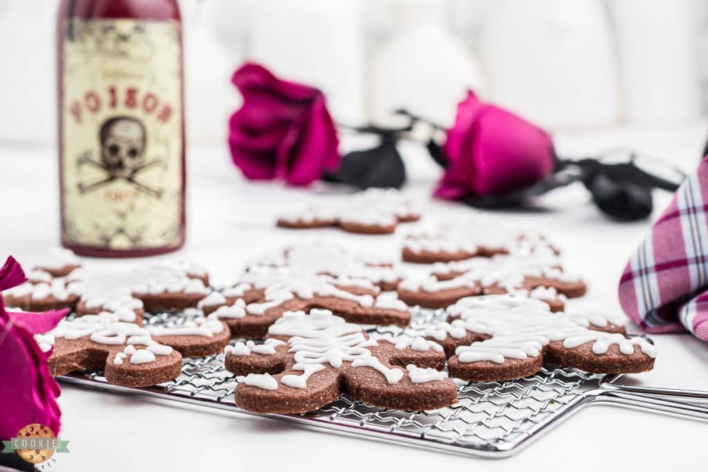 halloween skeleton cookies on a cooling rack