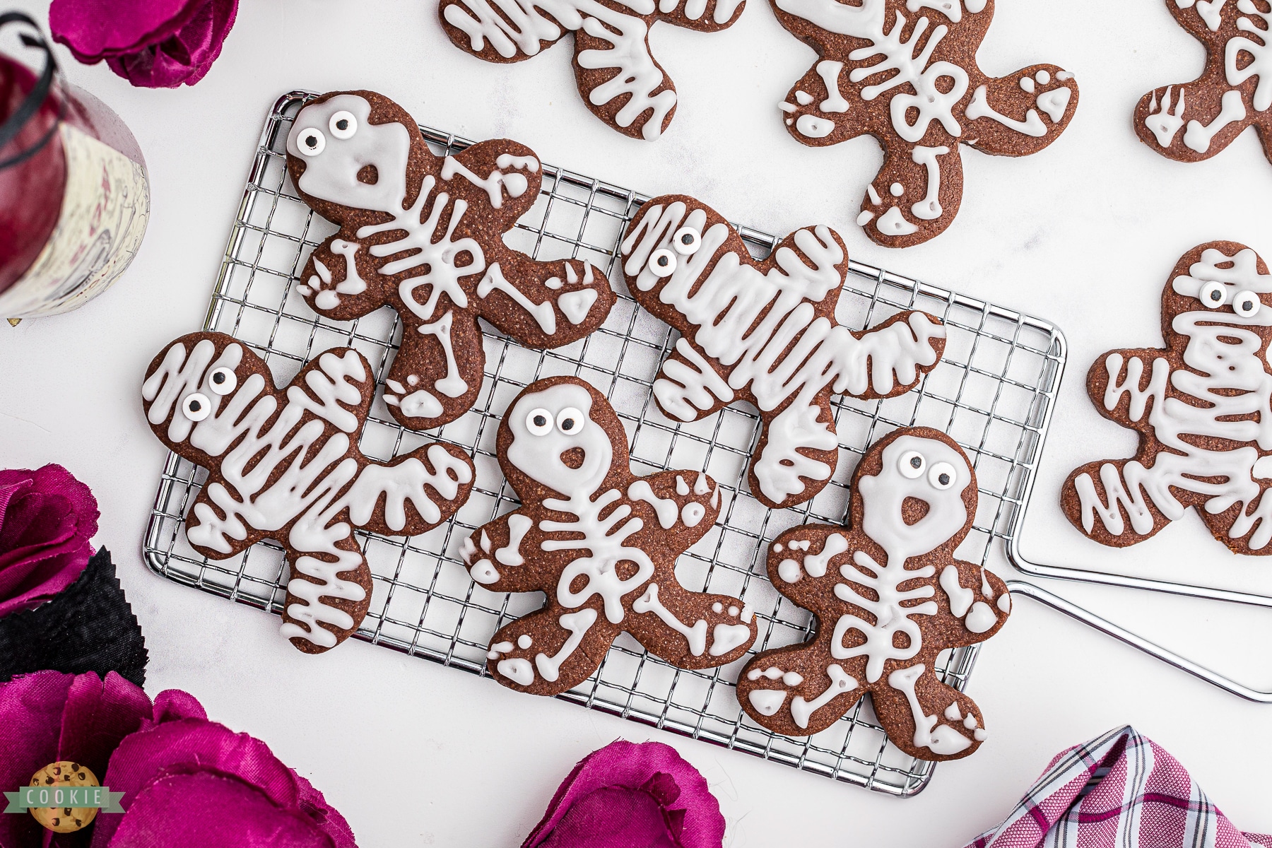 halloween skeleton cookies on a rack