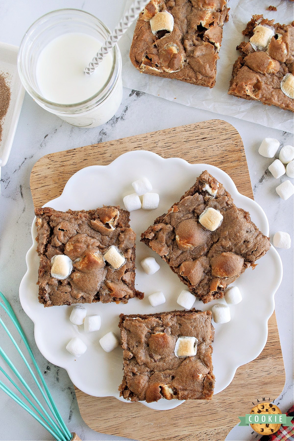 Swiss Miss Chocolate Chip Cookie Bars are made with hot cocoa mix, marshmallows and chocolate chips! Soft and chewy cookie bar recipe that tastes like a cup of hot chocolate! 