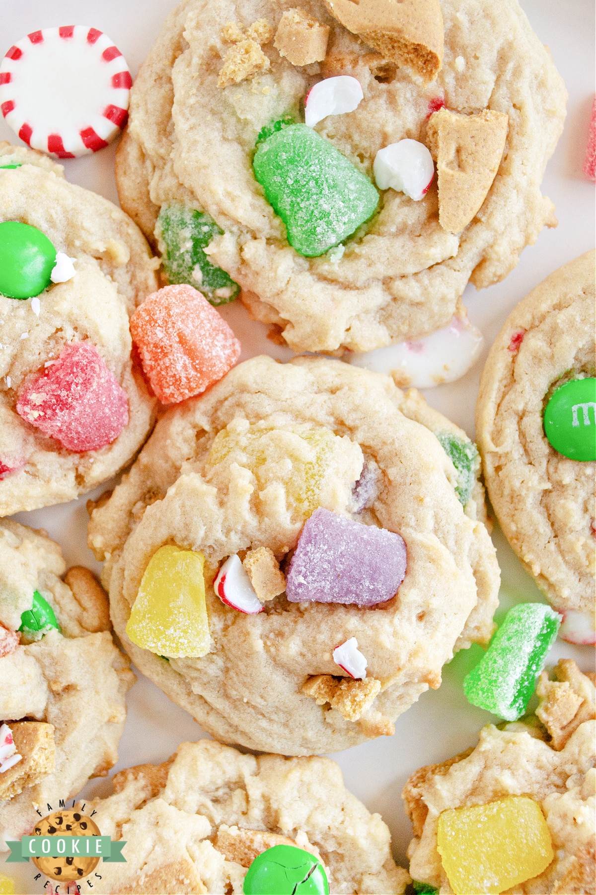 Gingerbread House Cookies made with gingerbread cookies, gum drops, and peppermint candies. If you can use it to decorate a gingerbread house with, you can put it in these cookies!