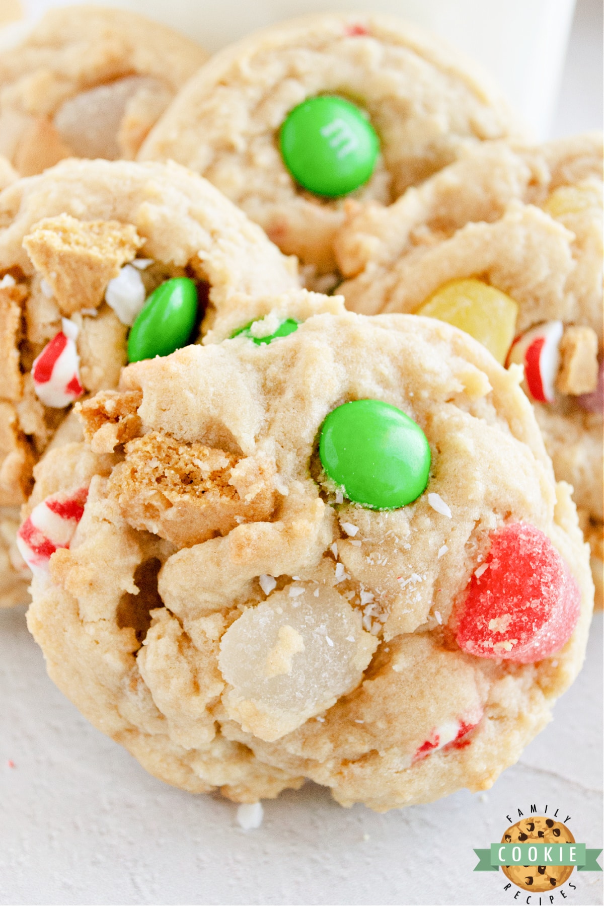 Gingerbread House Cookies made with gingerbread cookies, gum drops, and peppermint candies. If you can use it to decorate a gingerbread house with, you can put it in these cookies!