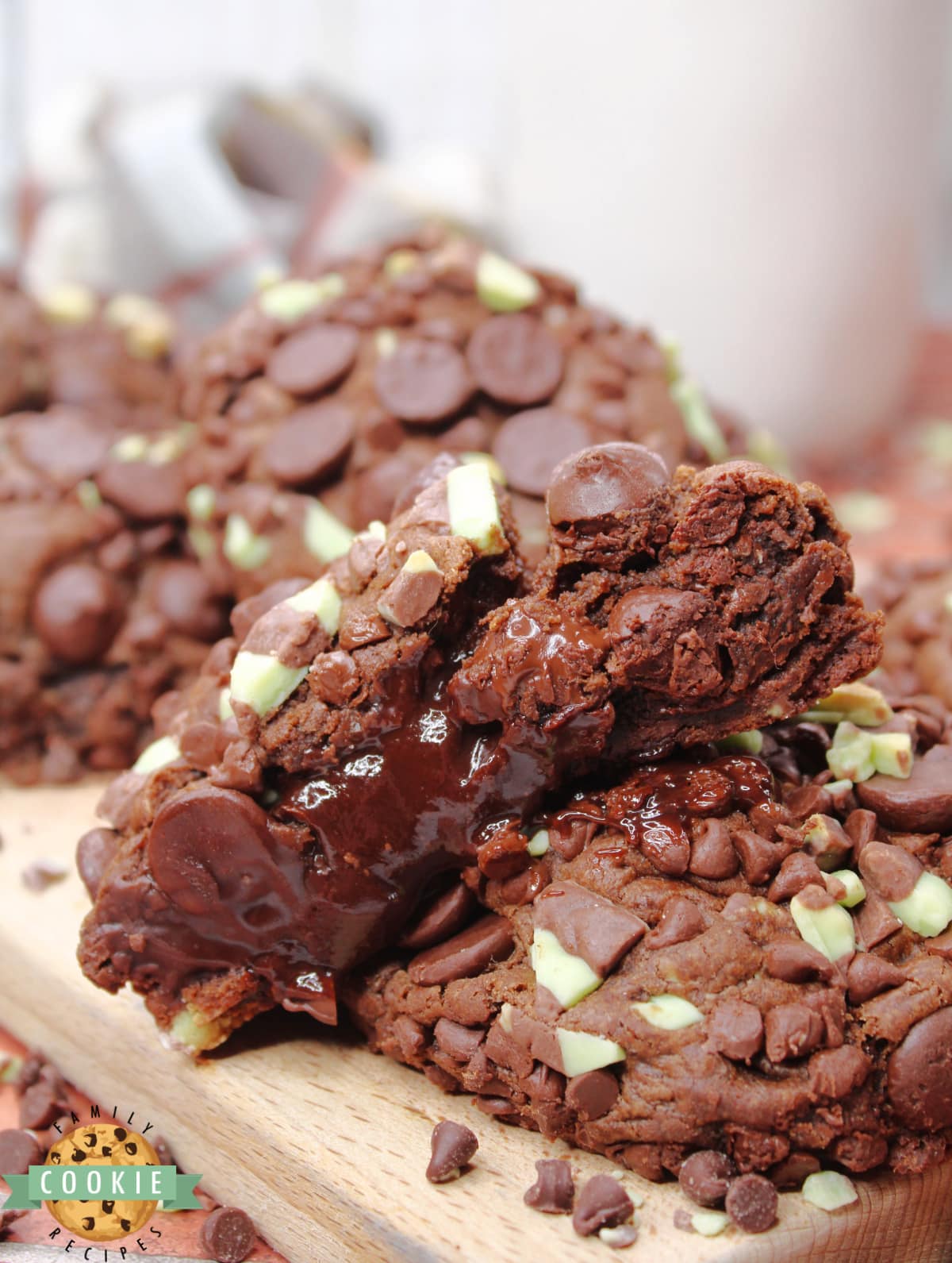 Andes Mint Stuffed Chocolate Cookies are rich chocolate mint cookies that are filled with chocolate ganache and a grasshopper cookie in the middle. Tons of mint flavor in this amazing chocolate cookie recipe!  