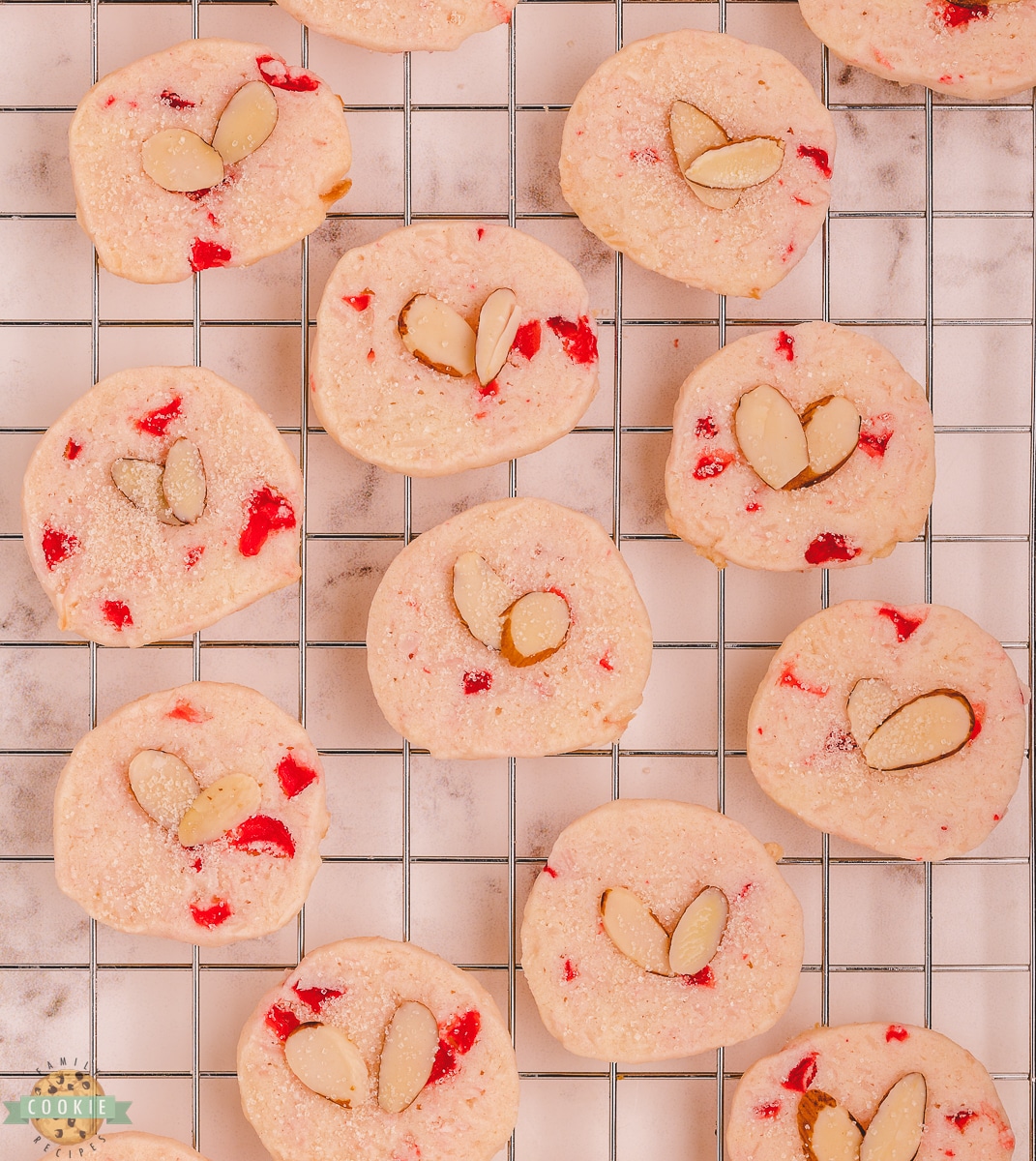 coconut almond cherry shortbread on a cooling rack