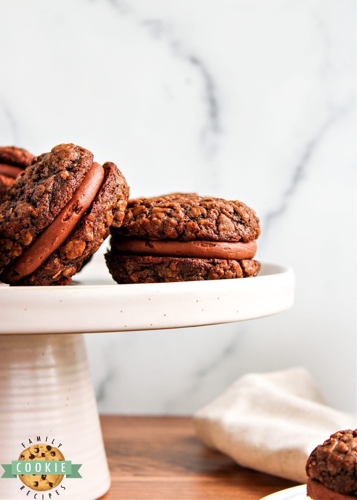 Chocolate sandwich cookies with chocolate buttercream frosting