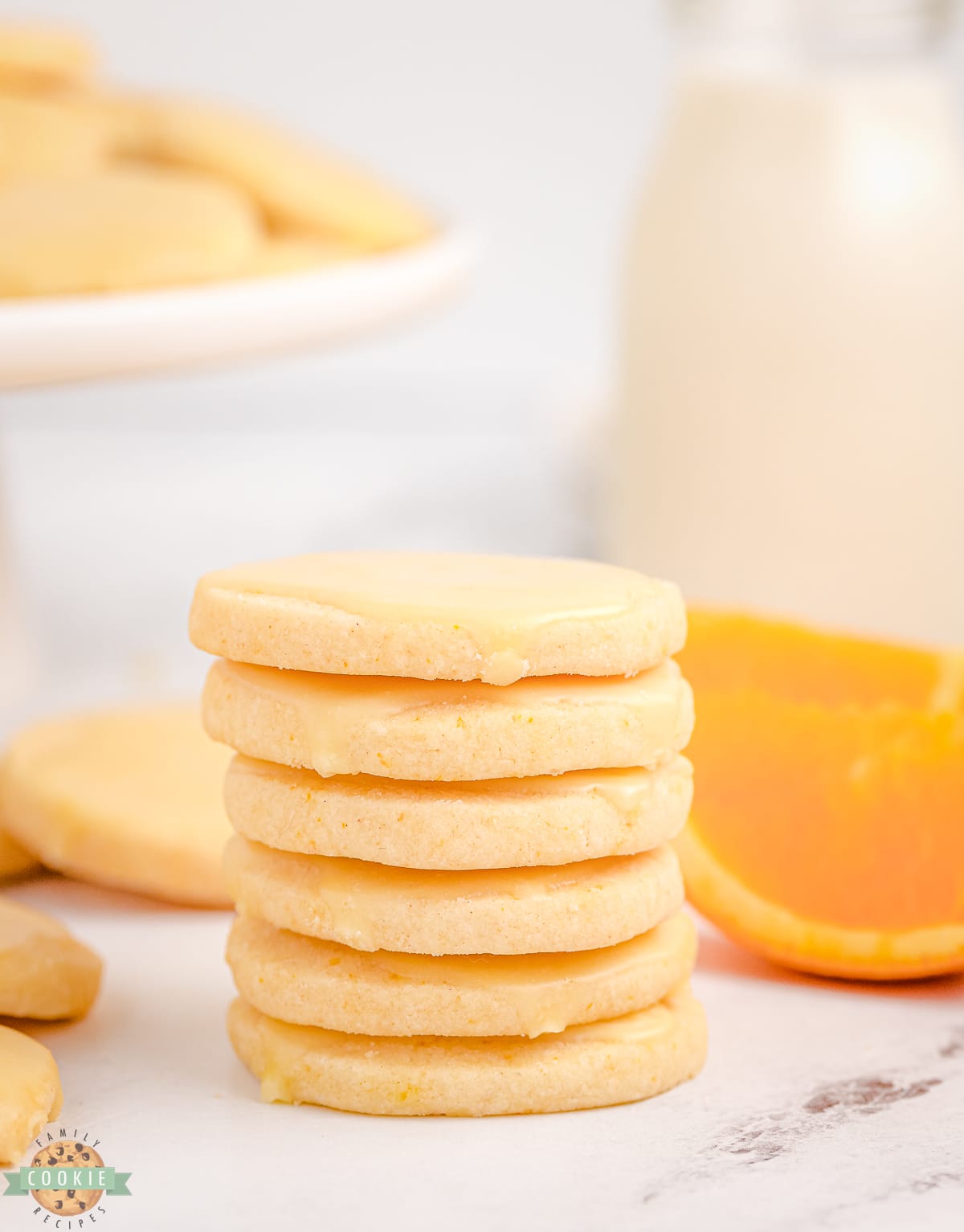 bright orange cookies in a stack