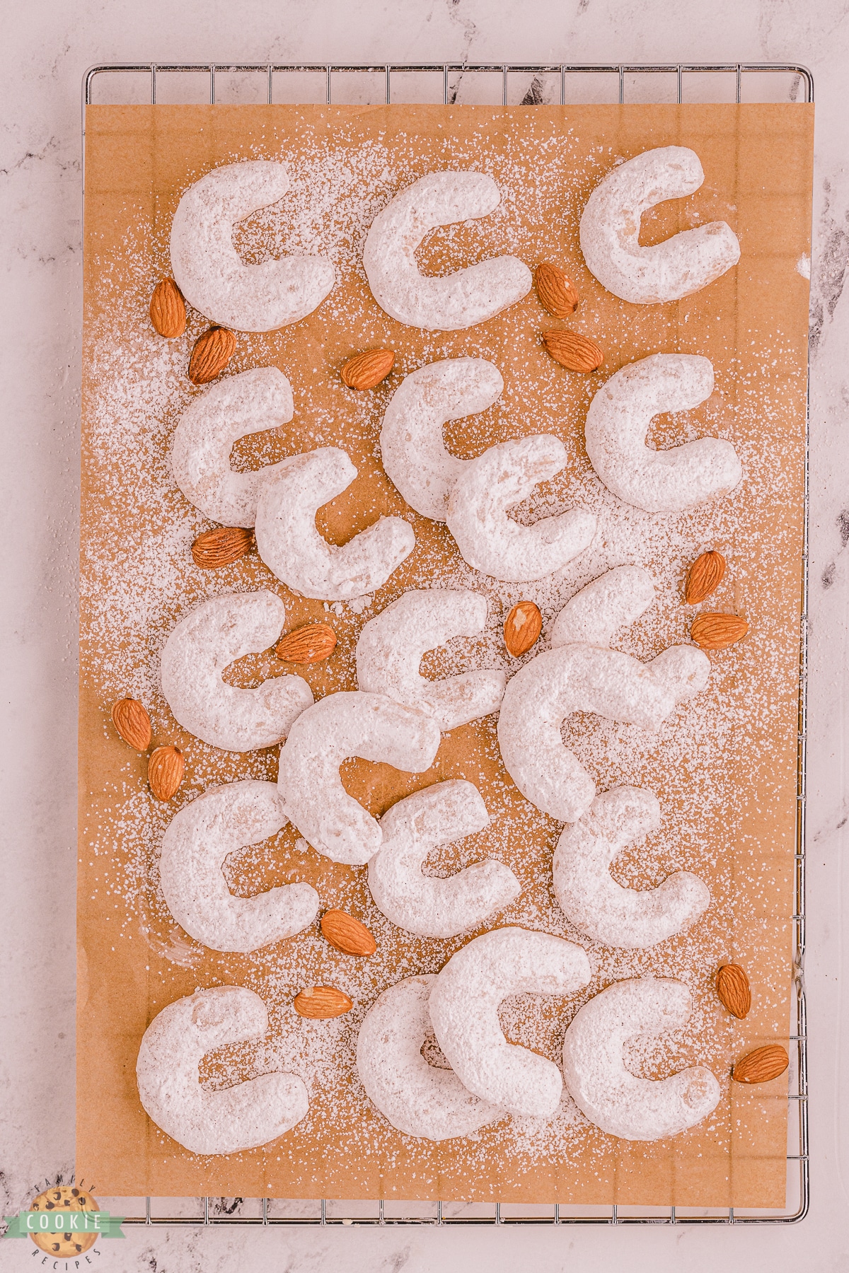 crescent cookies on parchment paper