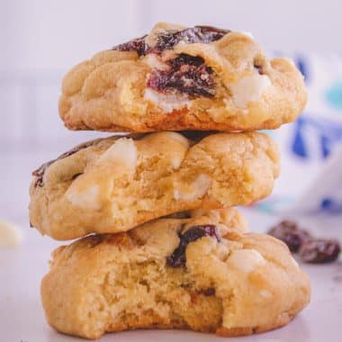white chocolate cherry cookies in a stack