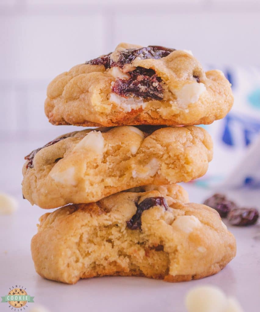 white chocolate cherry cookies in a stack