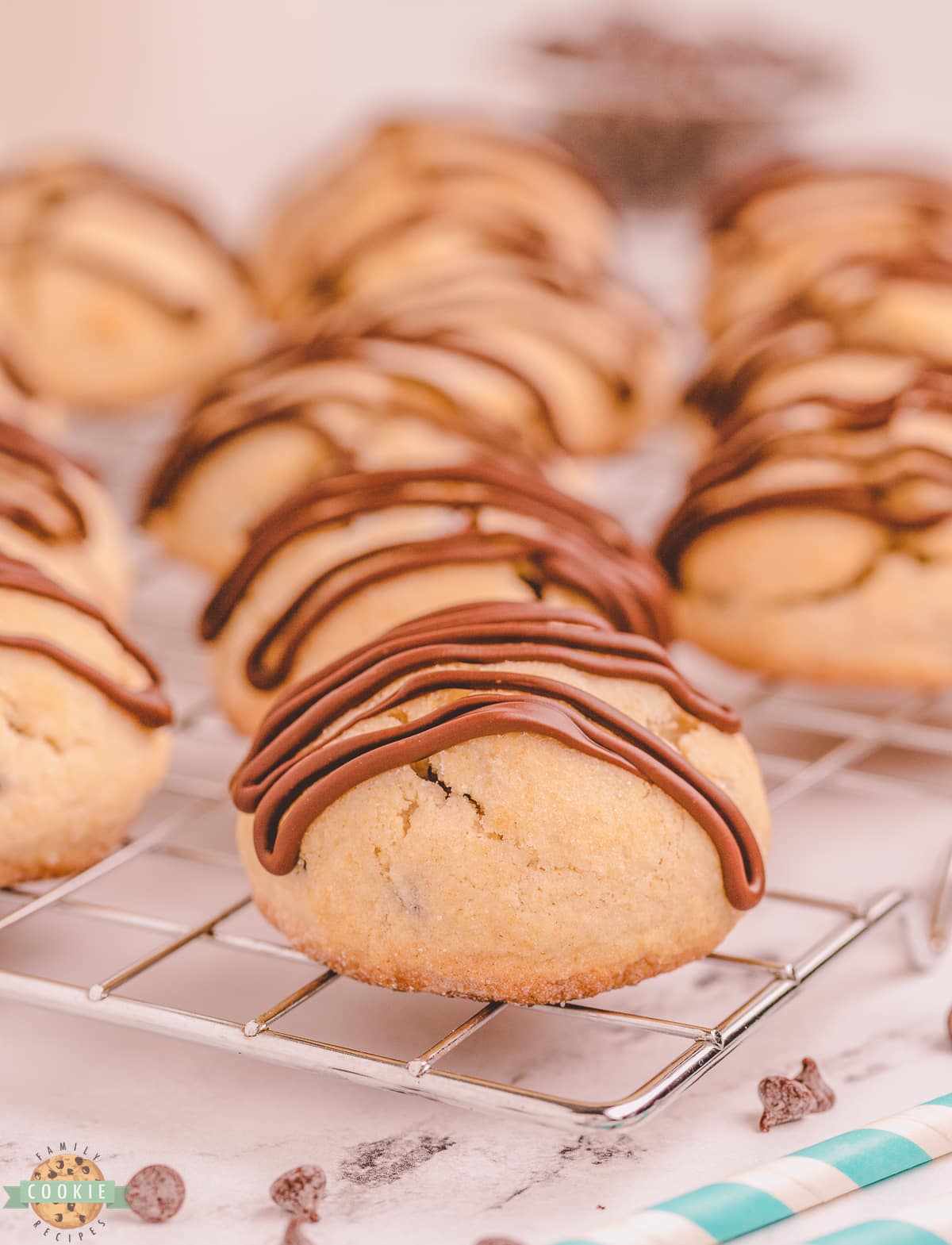 chocolate drizzle on top of a scone cookie