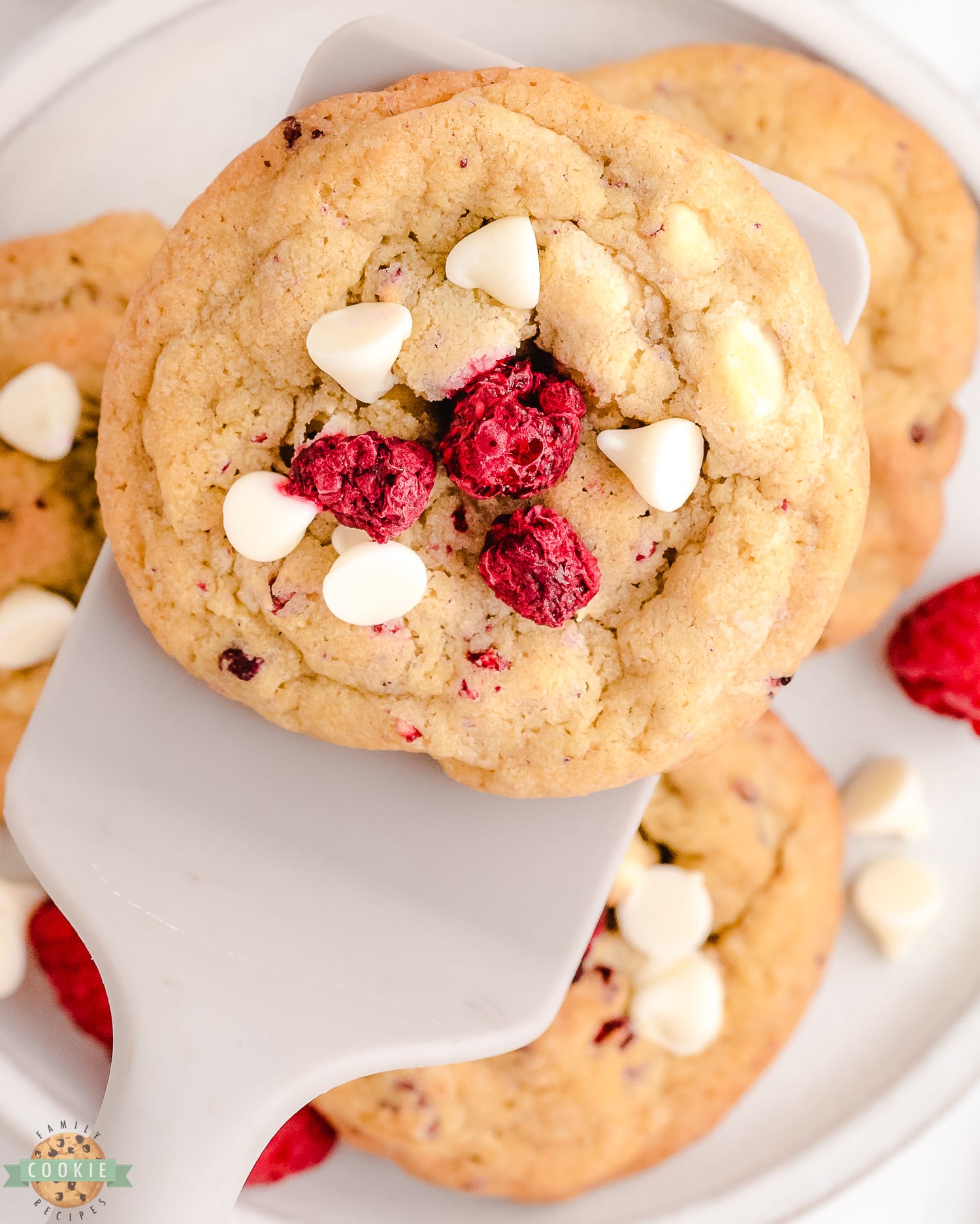 serving a raspberry cookie