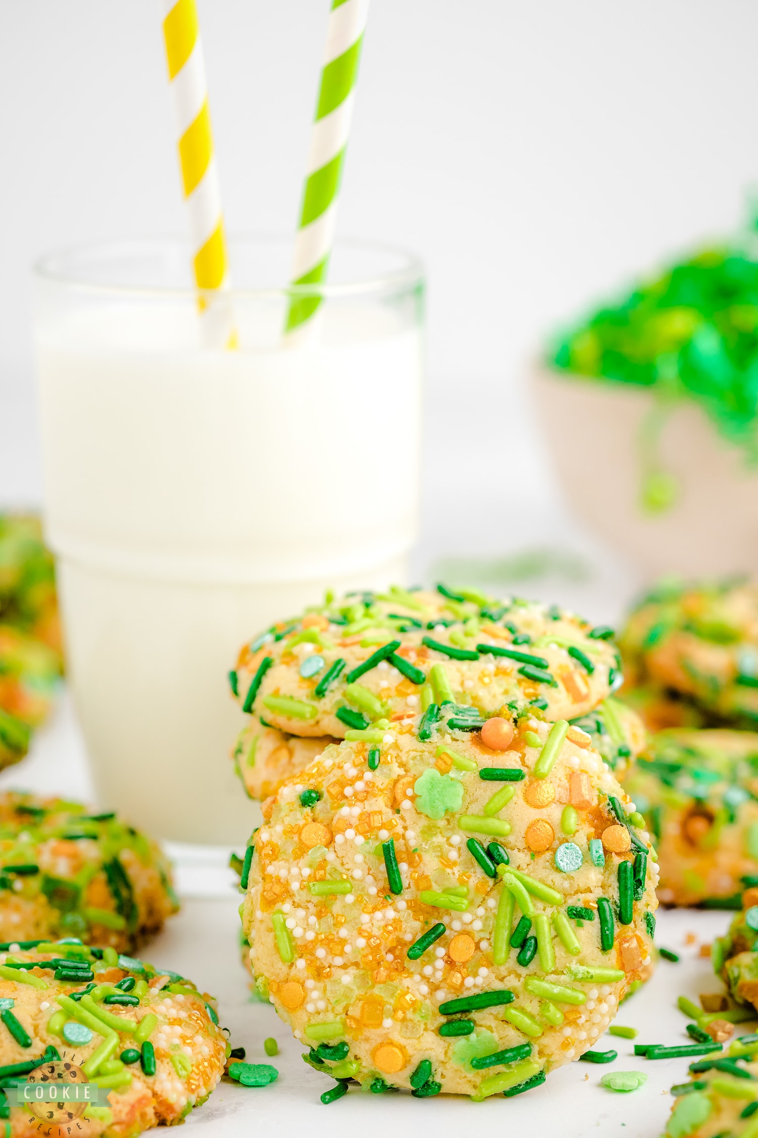 green sprinkle cookies with milk