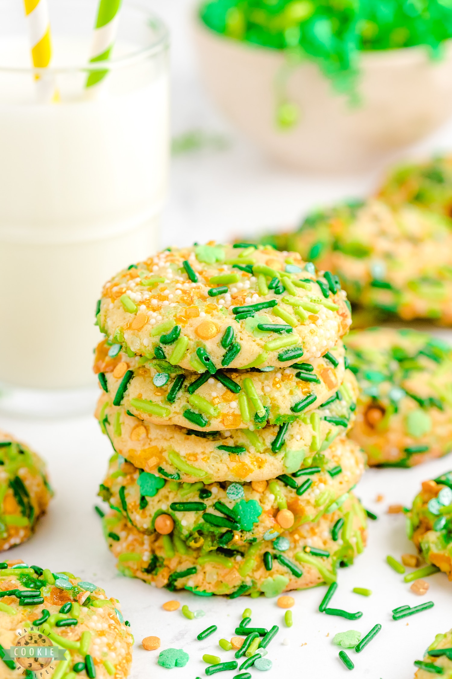 stack of pudding cookies rolled in green and gold sprinkles