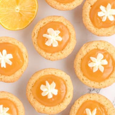 lemon curd cookies with dollops of whipped cream on top