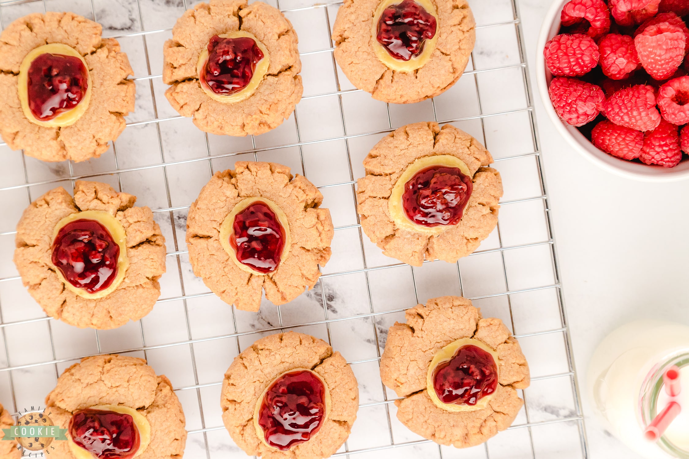 raspberry cookies on a cooling rack