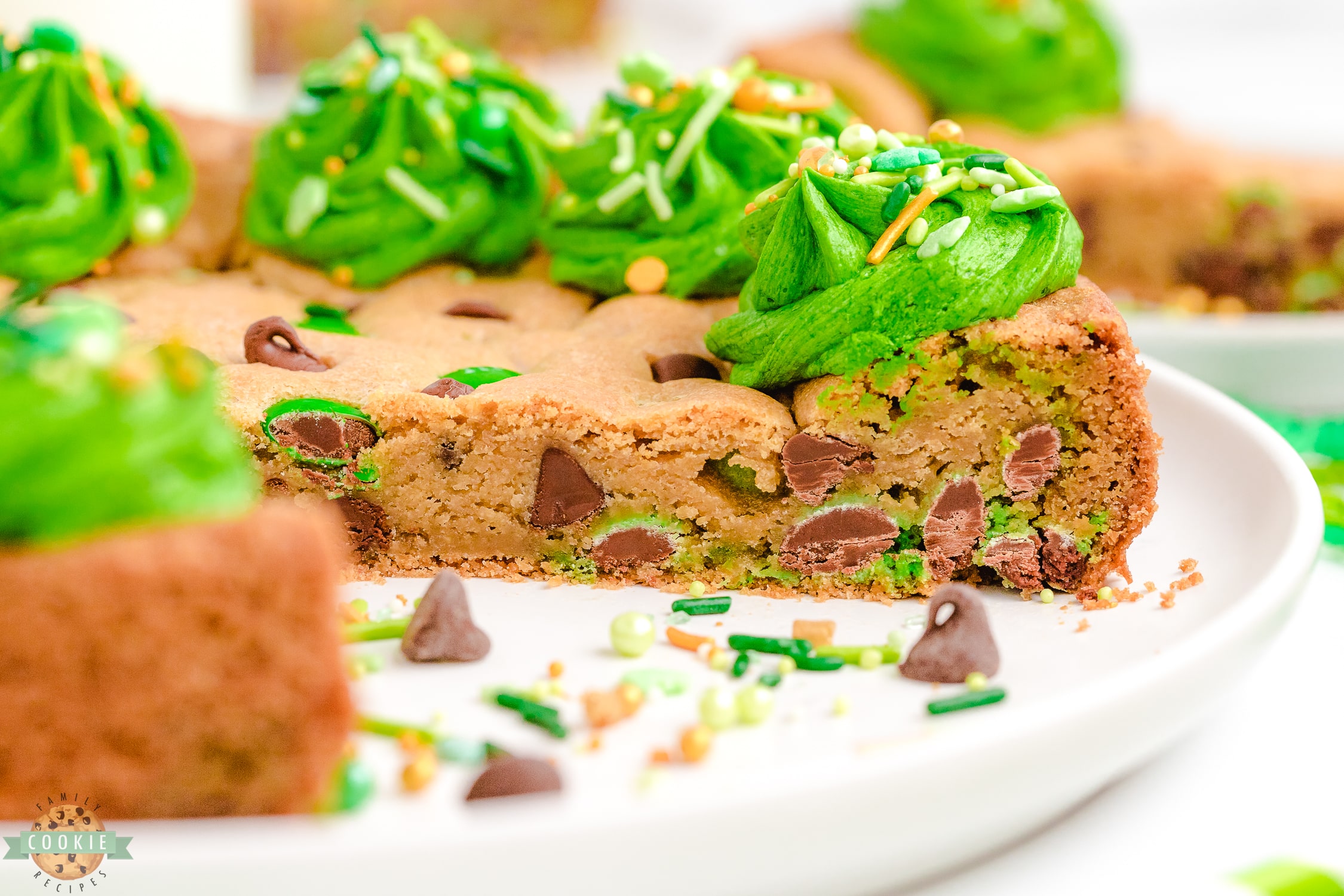 slice of a green St. Patrick's day cookie cake