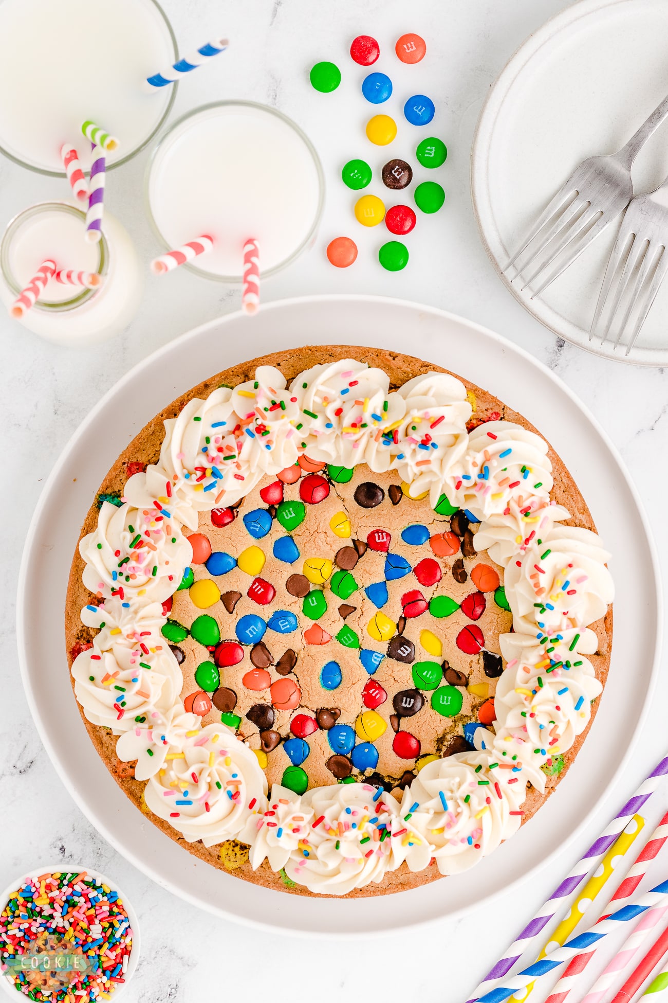 whole birthday cake cookie topped with M&Ms and sprinkles