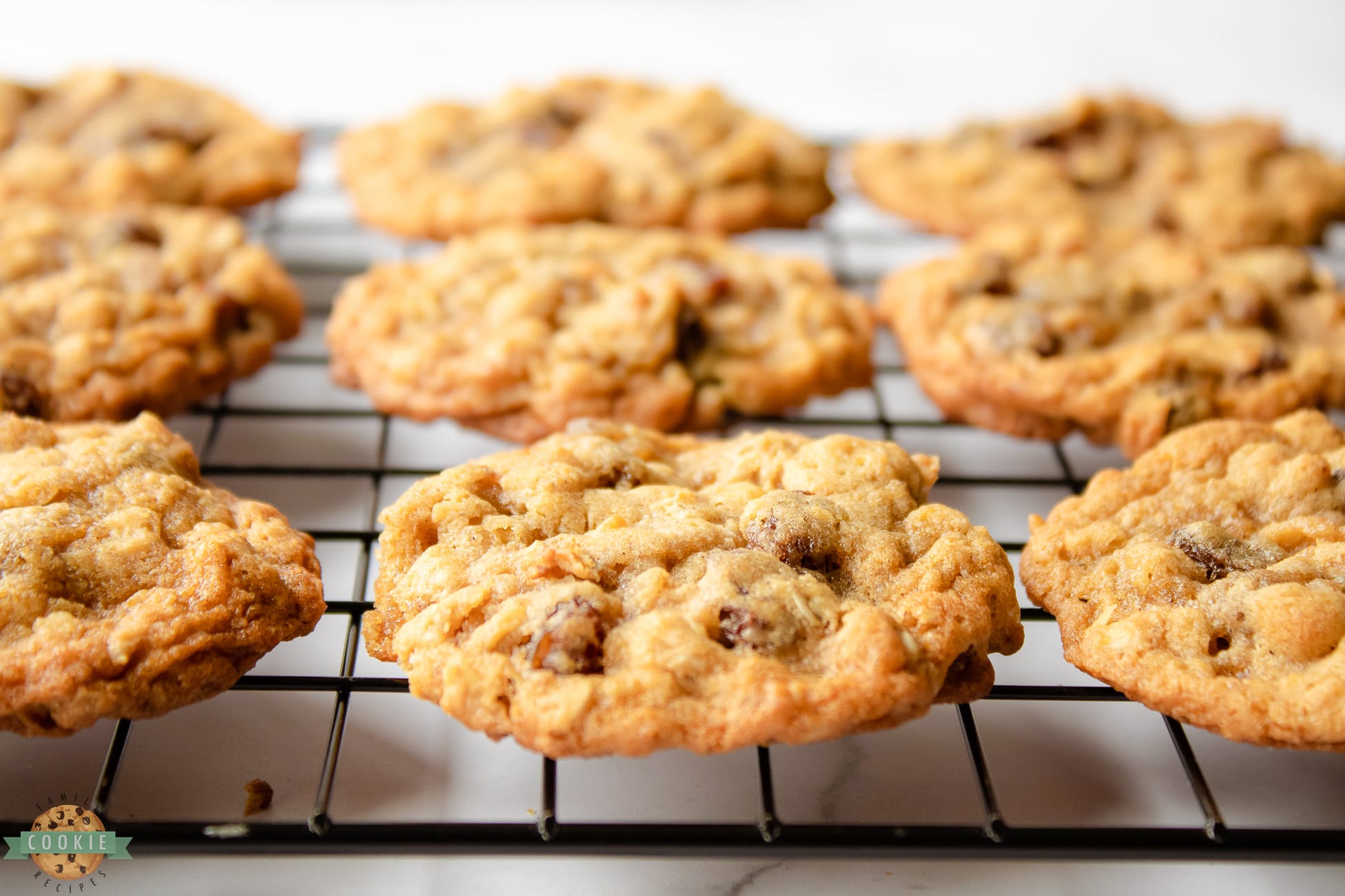 chewy oatmeal raisin cookies on a cooling rack