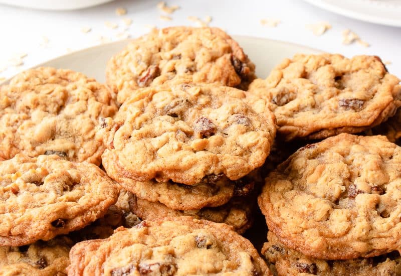 stacks of chewy oatmeal raisin cookies on a plate