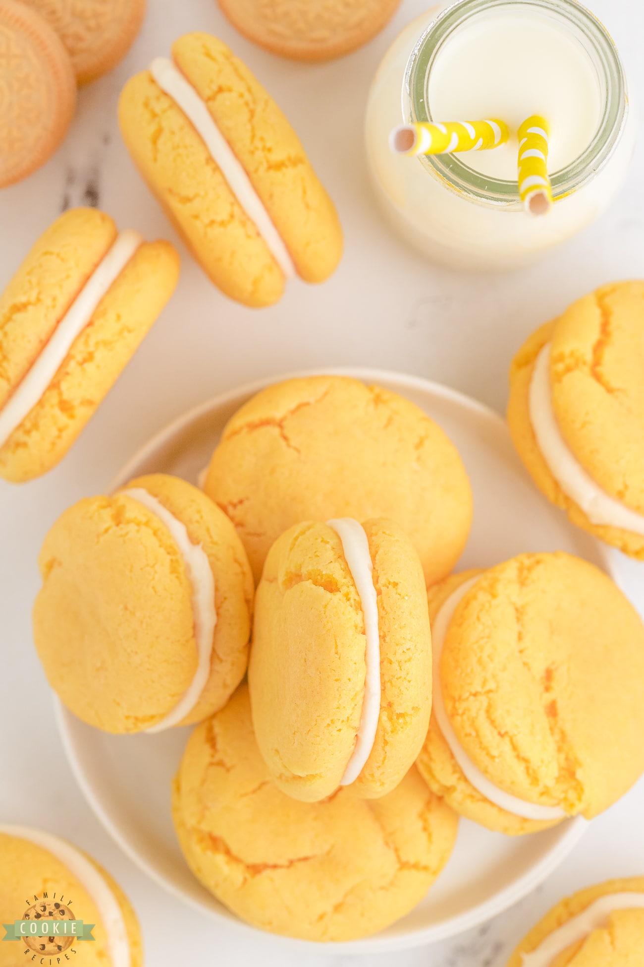 golden oreo cookies with cream cheese frosting inside