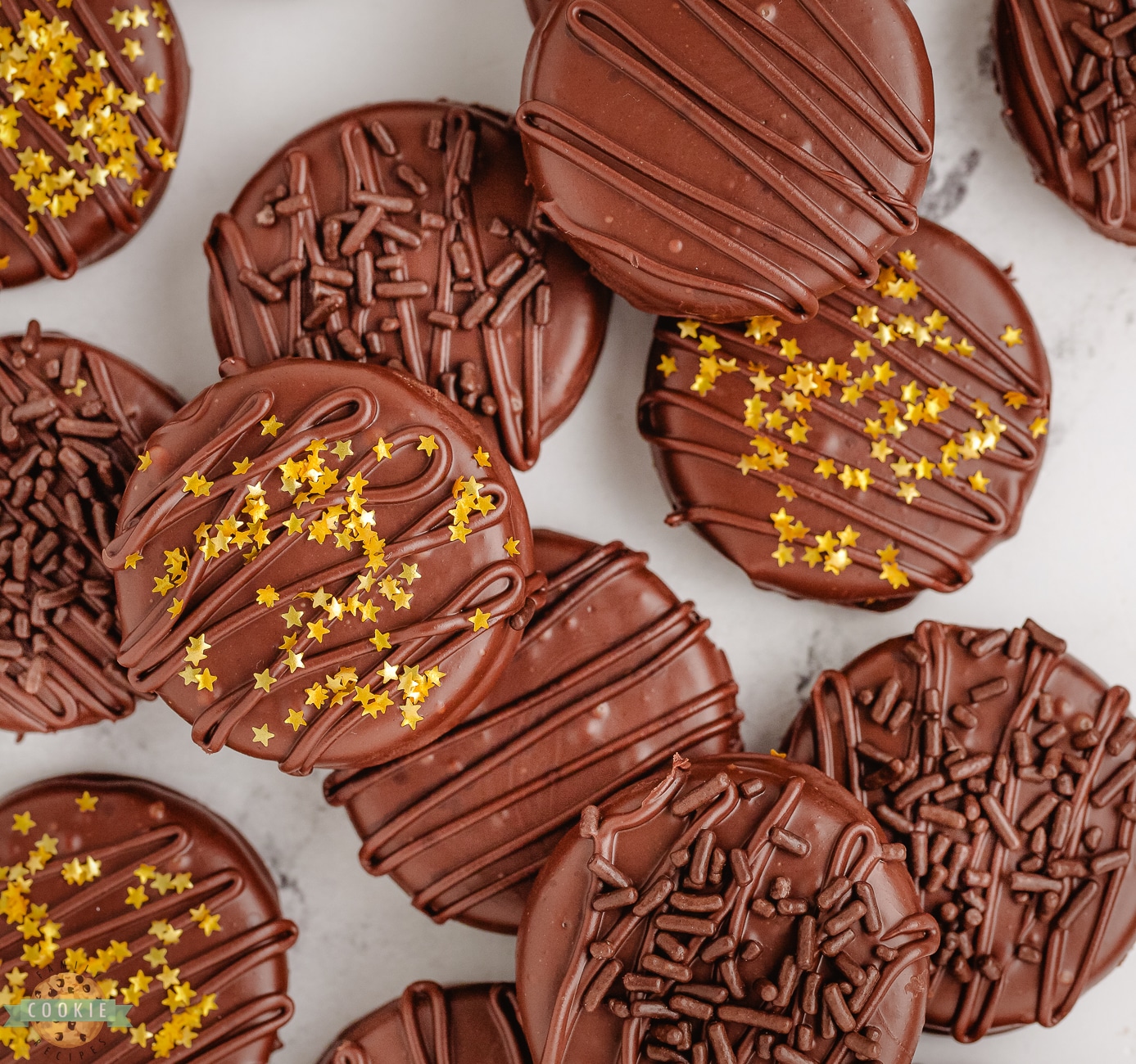 chocolate covered oreos with chocolate sprinkles