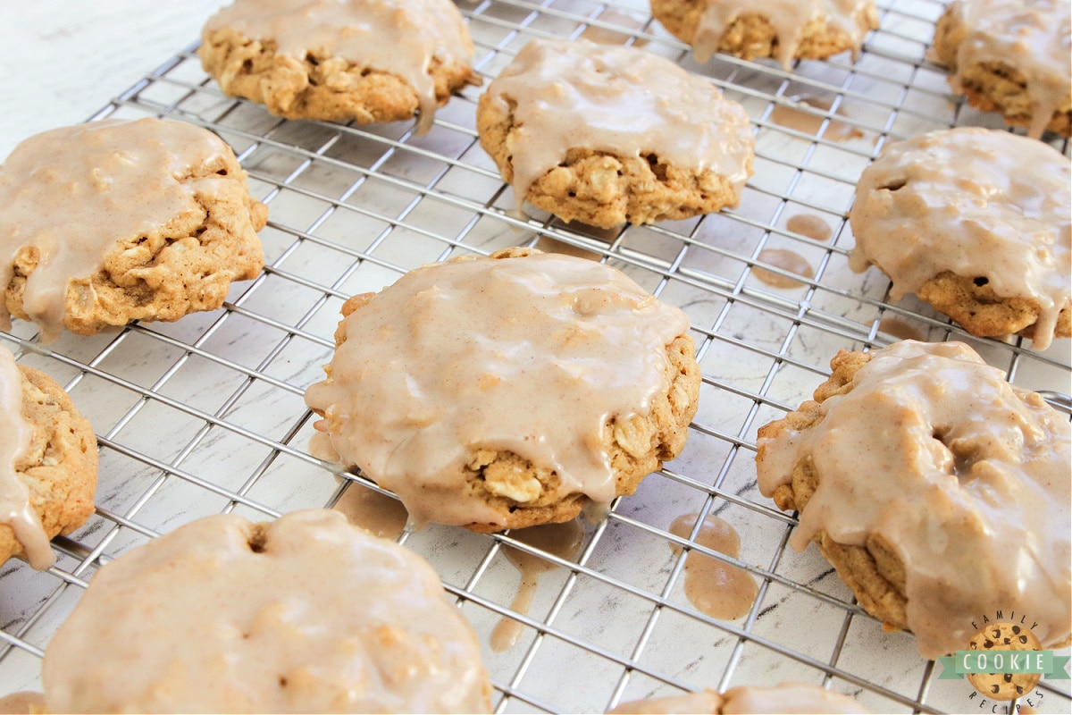 Glazed cookies drying on wire rack. 