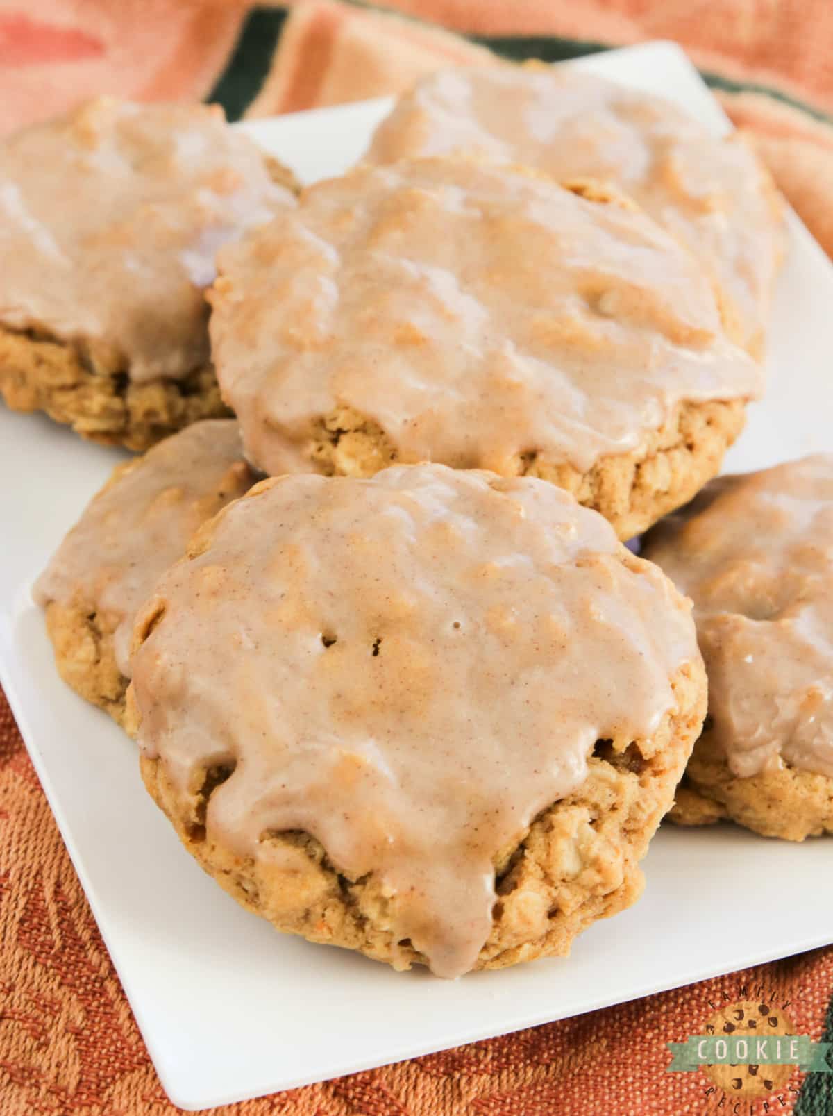 Glazed Pumpkin Oatmeal Cookies are soft, chewy oatmeal cookies packed with pumpkin and topped with a simple cinnamon sugar icing. The perfect cookie for fall!