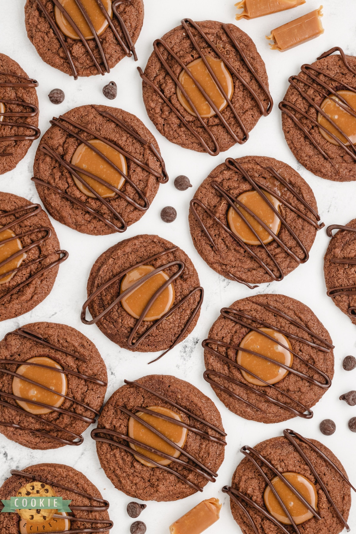 Chocolate thumbprint cookies with a chocolate drizzle. 