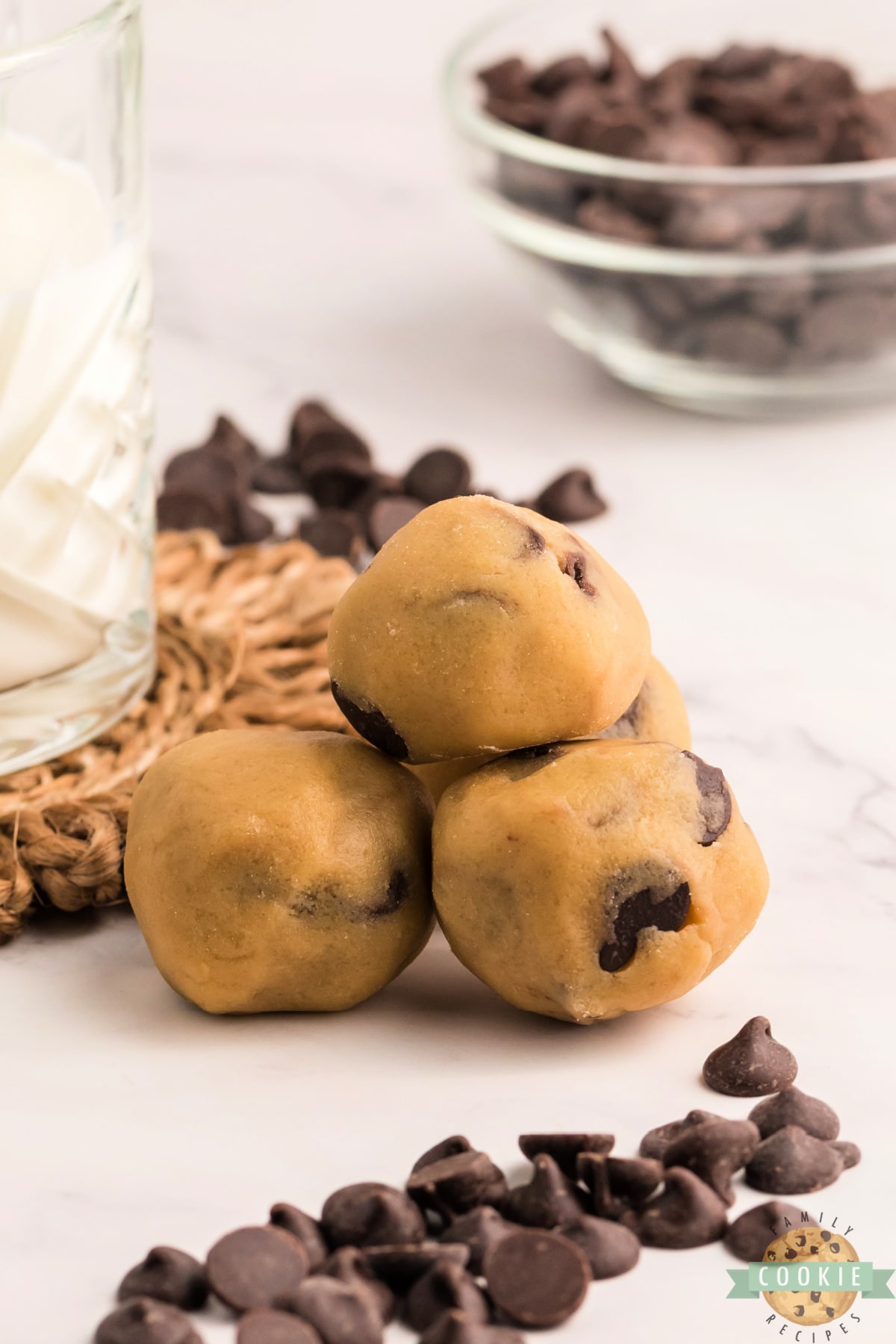 Chocolate Chip Cookie Dough Bites are the ultimate way to enjoy eating raw cookie dough, without worrying about the uncooked egg and flour.  Edible chocolate chip cookie dough that is safe to eat, and perfectly portioned for a quick treat!