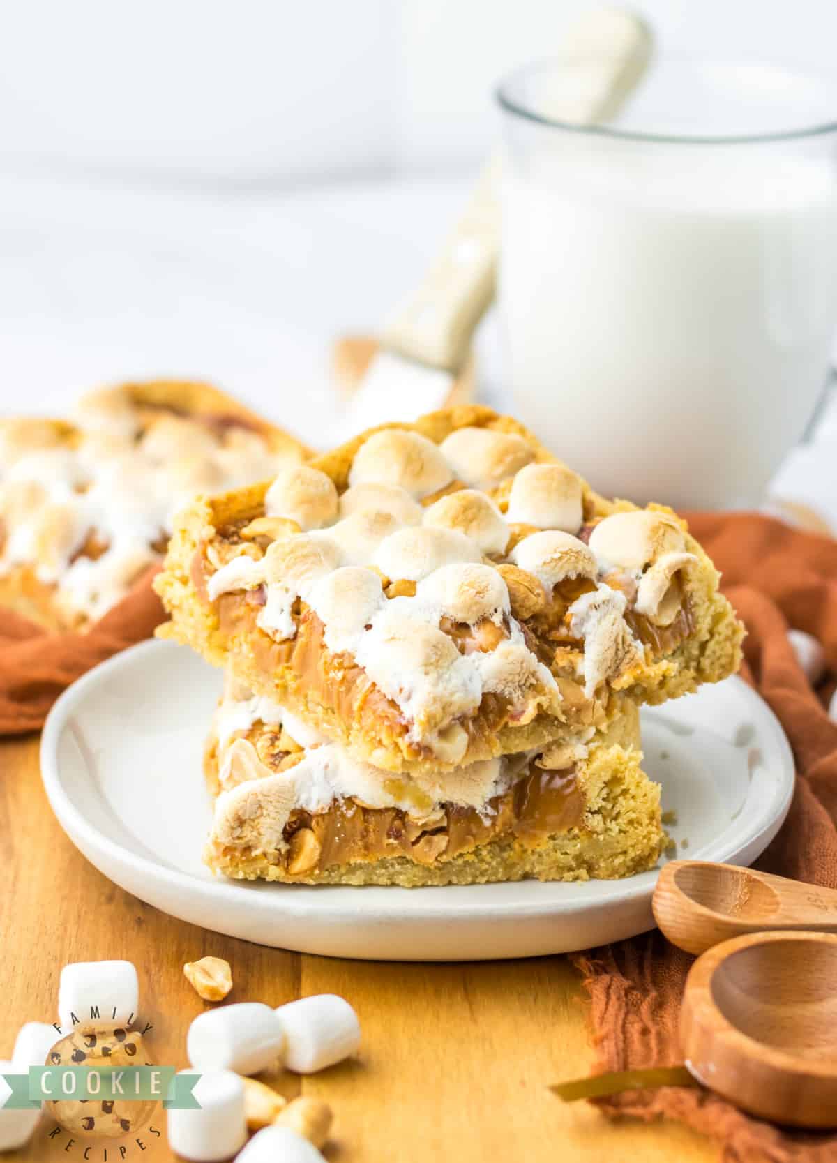 Easy Peanut Caramel Cookie Bars are made with only 5 ingredients! Chewy cookie bar recipe made with a sugar cookie crust that is topped with melted caramel, peanuts and marshmallows. 