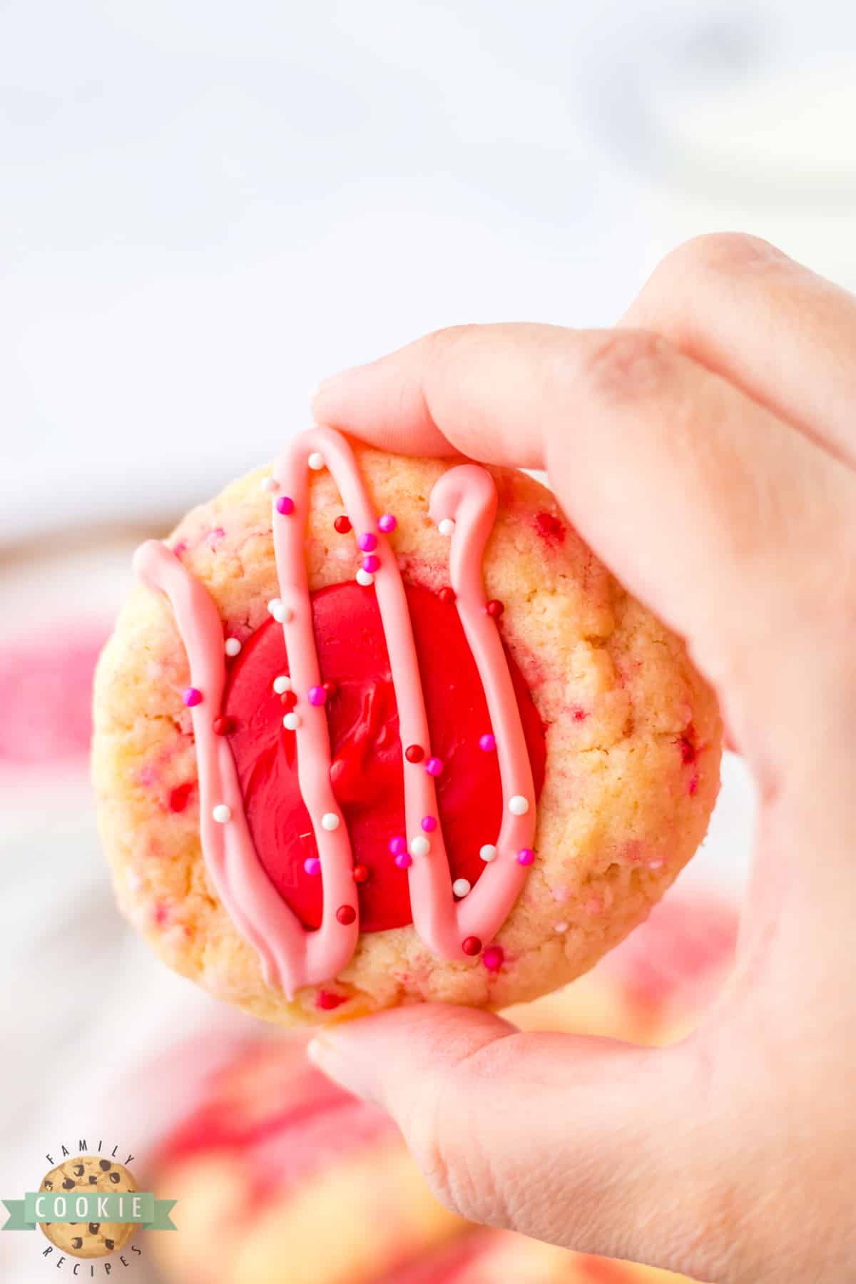 Cookie filled with melted red chocolate. 