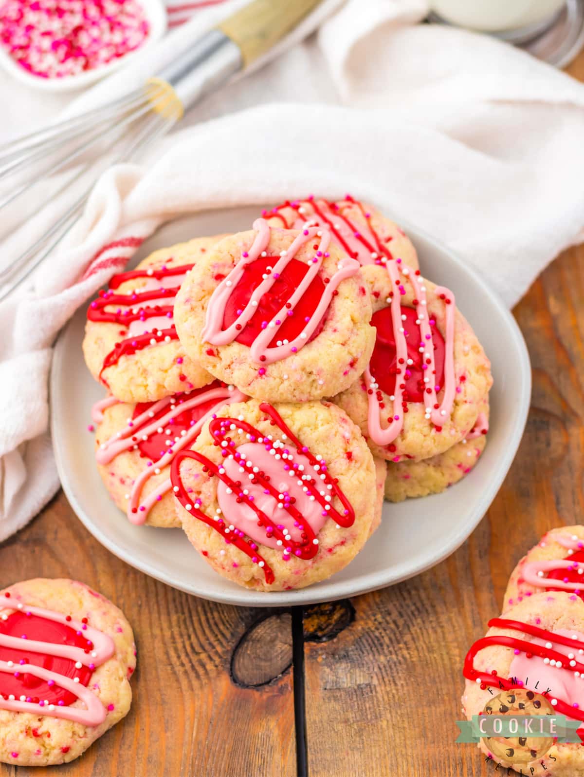 Plate of pink and red cookies.
