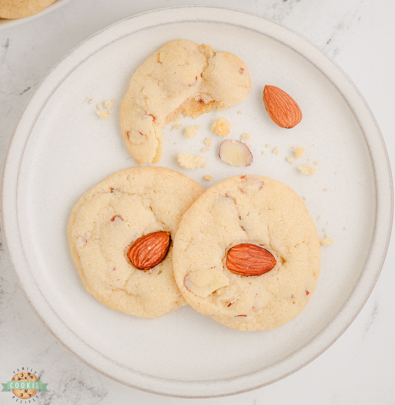 almond cookies with sliced almonds and a whole almond on top