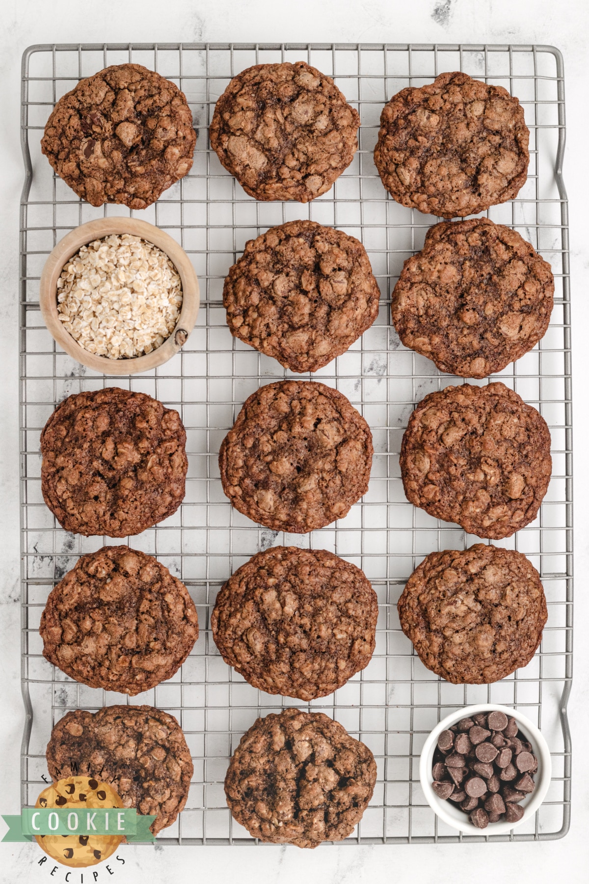 Chocolate oatmeal cookies on a wire rack to cool. 
