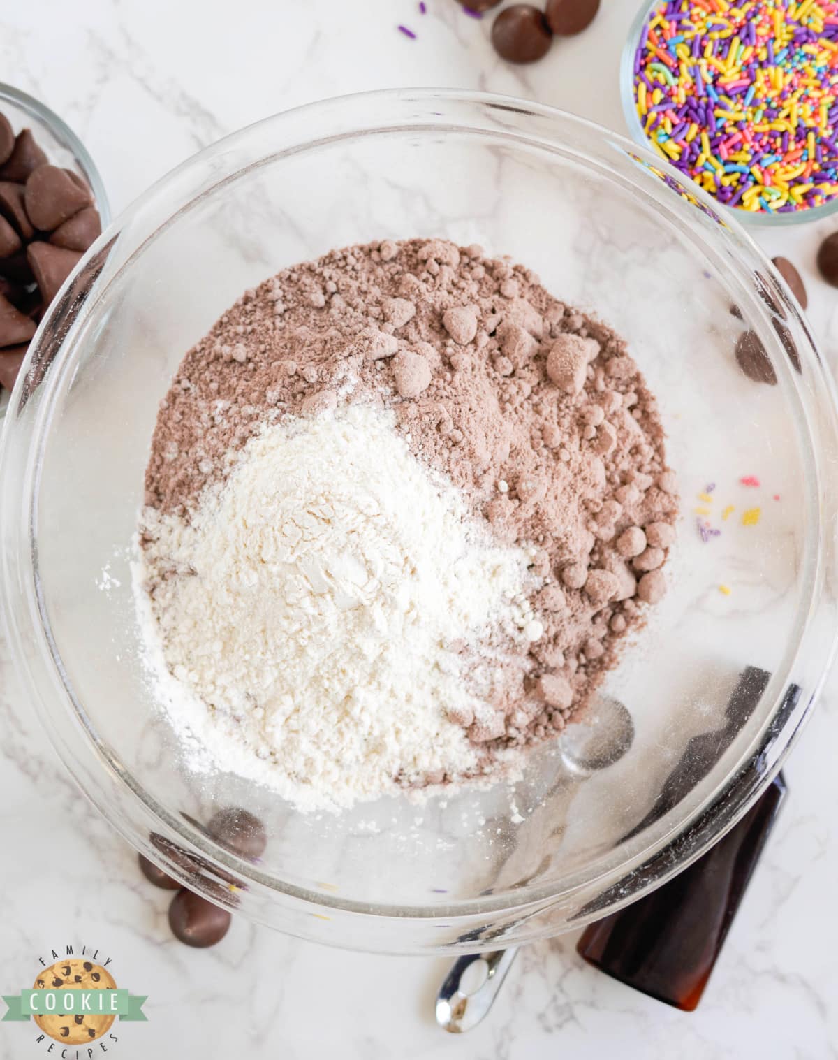 Mixing flour and brownie mix together. 