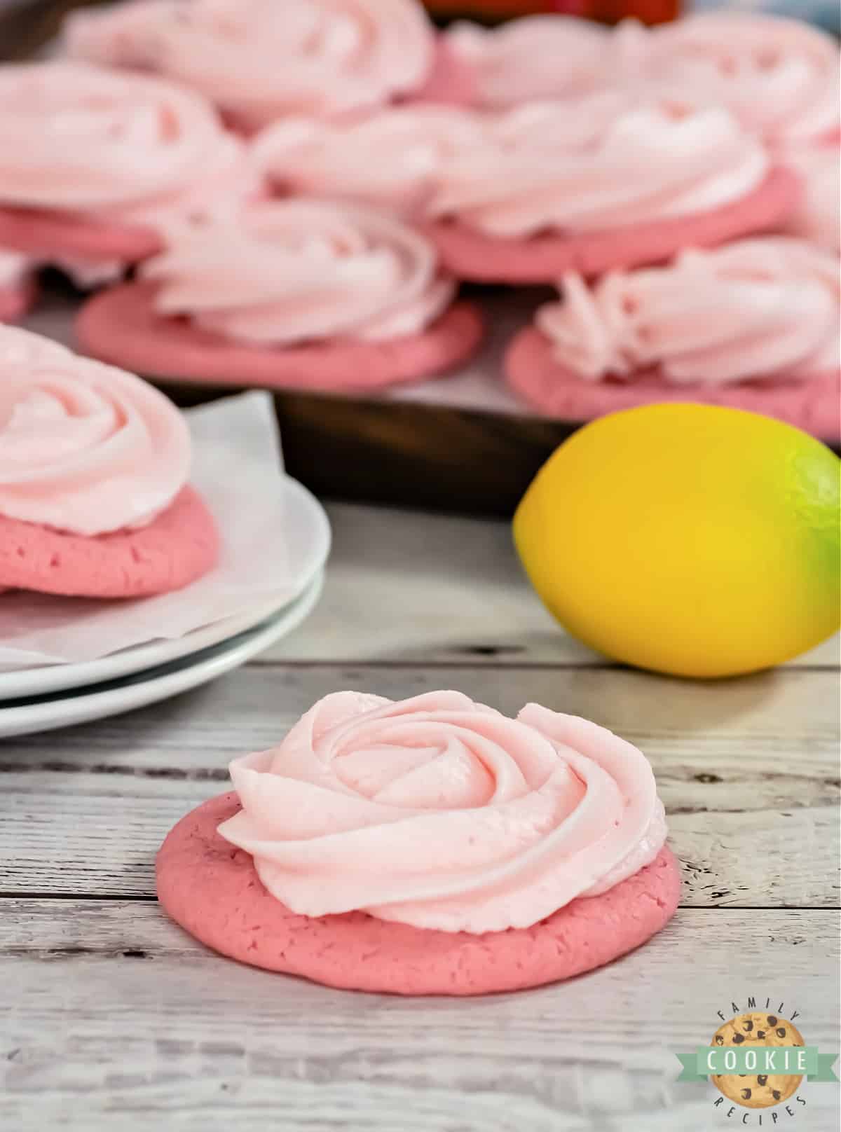 Pink Lemonade Cookies are soft, chewy, and packed with lemon flavor. Topped with a simple lemon frosting, these pink lemonade cookies are pretty, refreshing, and delicious. 