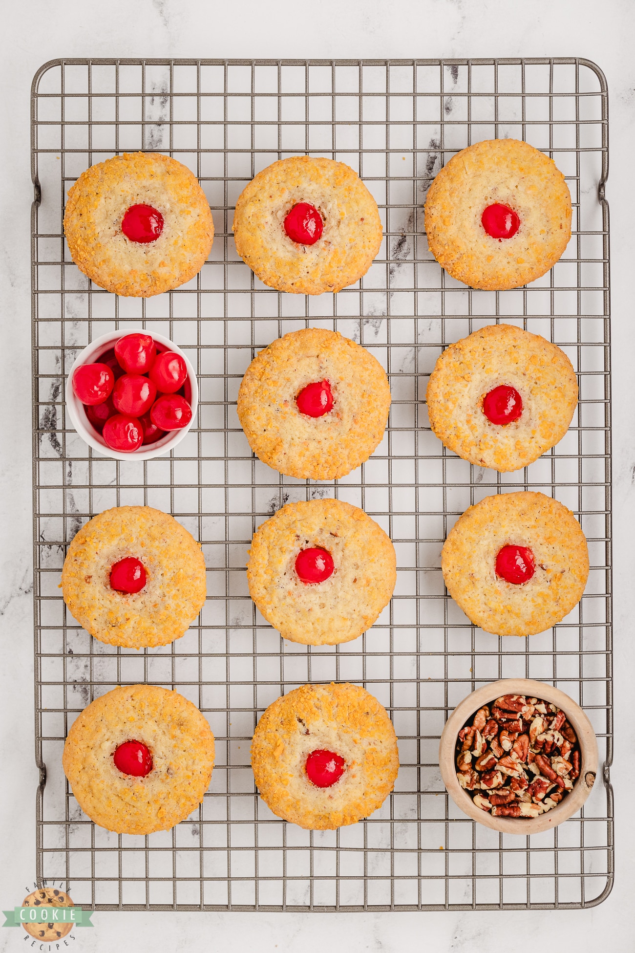 cherry crunch cookies on a cooling rack