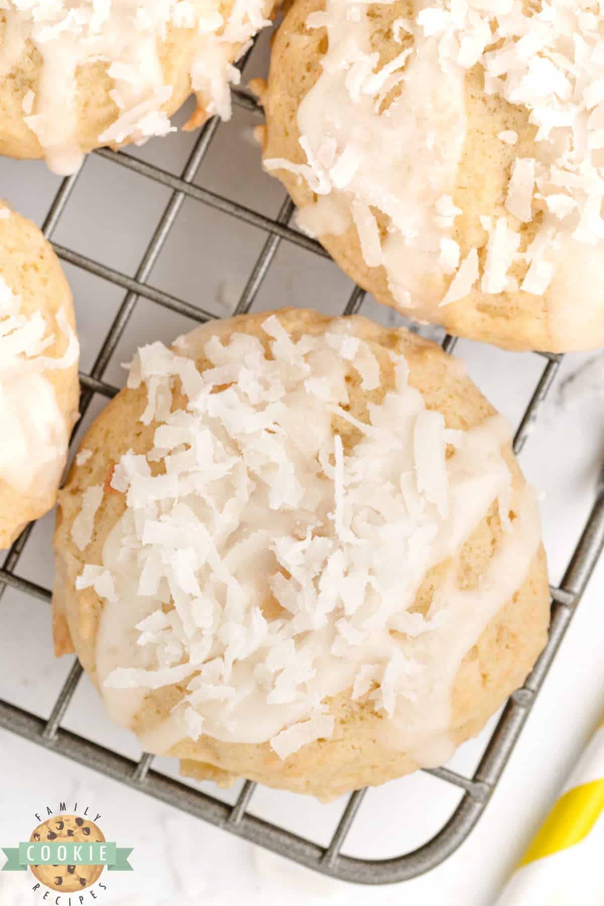 Cookie topped with pineapple glaze and shredded coconut. 