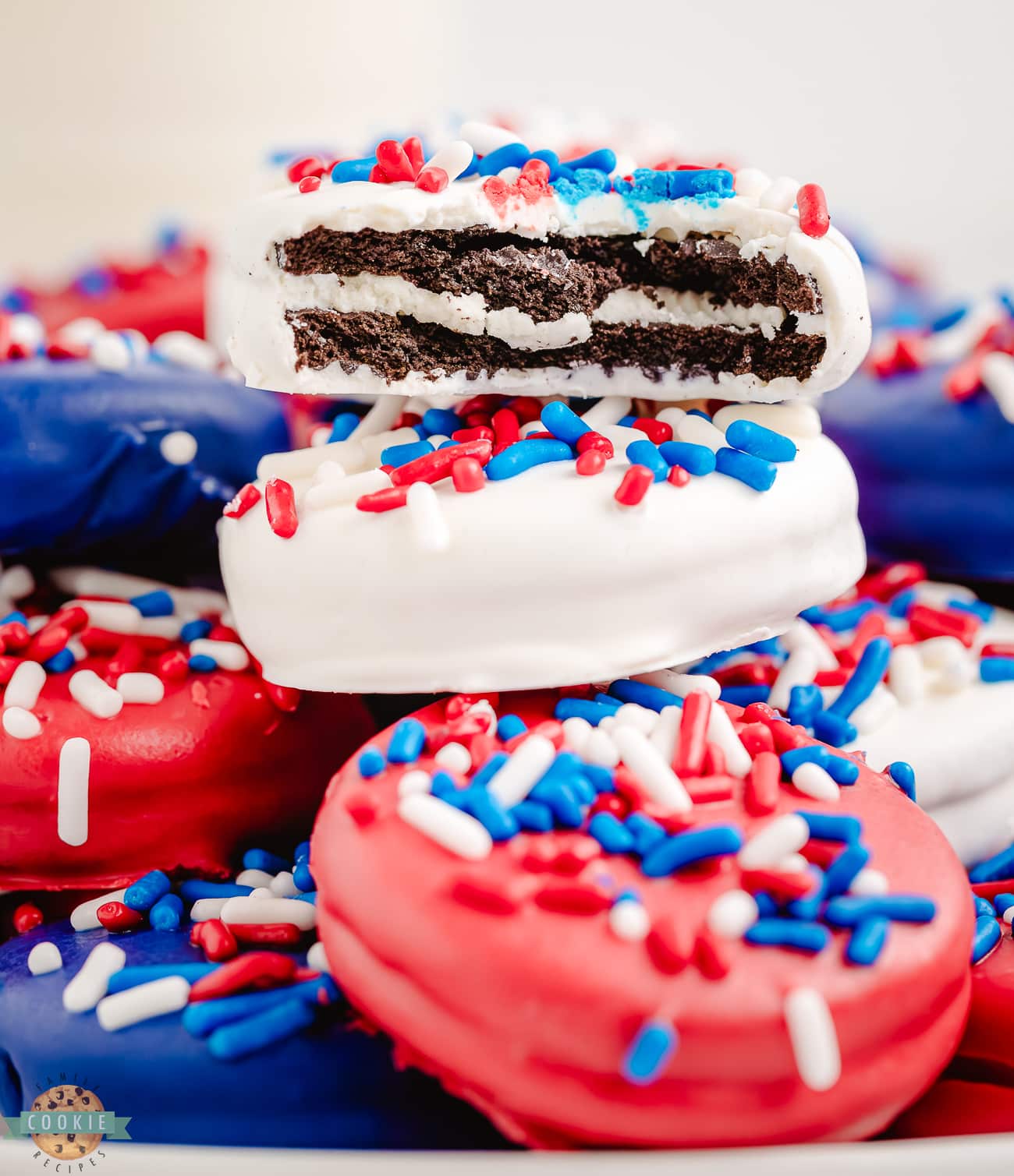 chocolate dipped Oreo cookies with a bite taken out