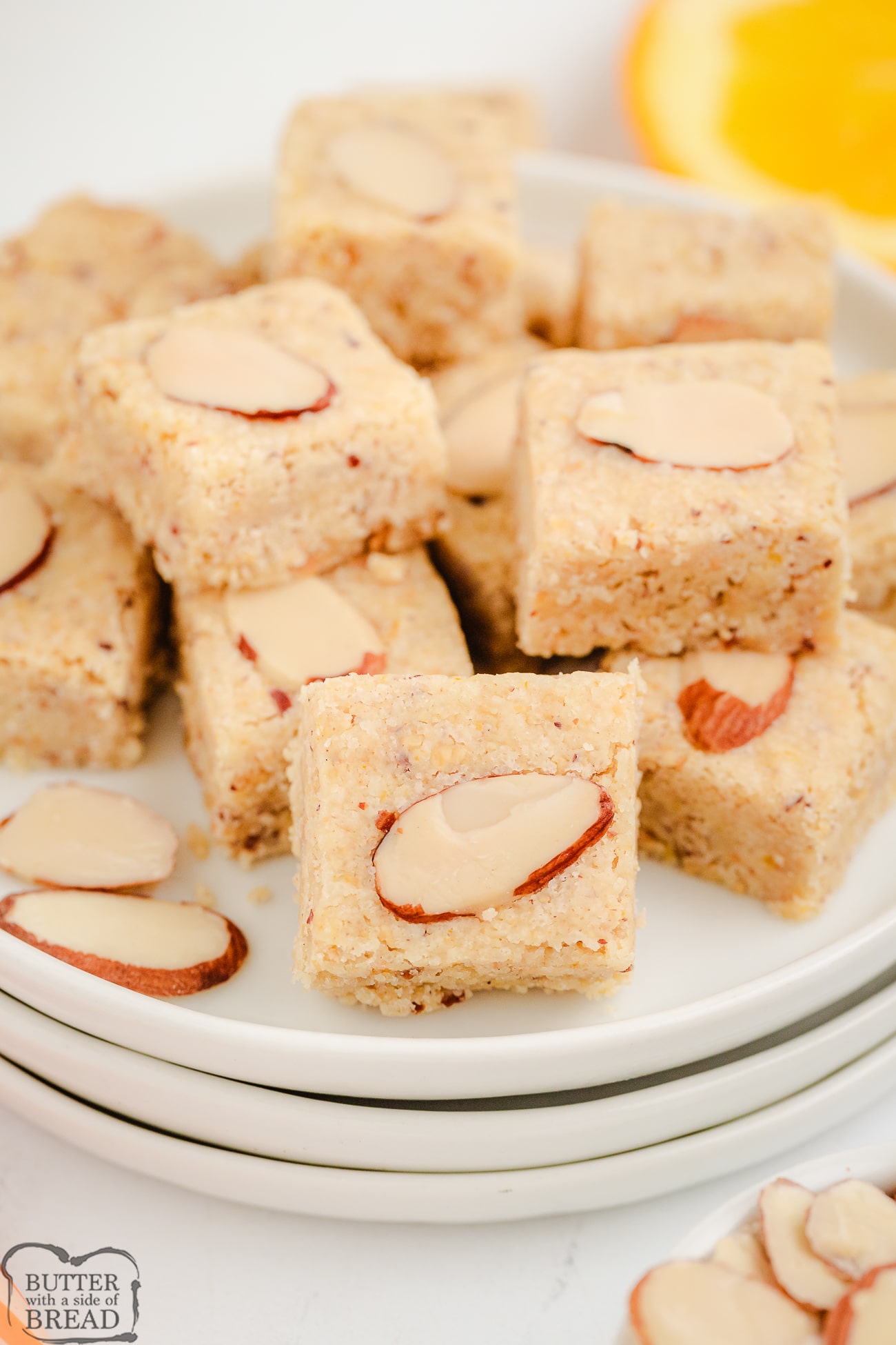 citrus almond shortbread squares on a plate