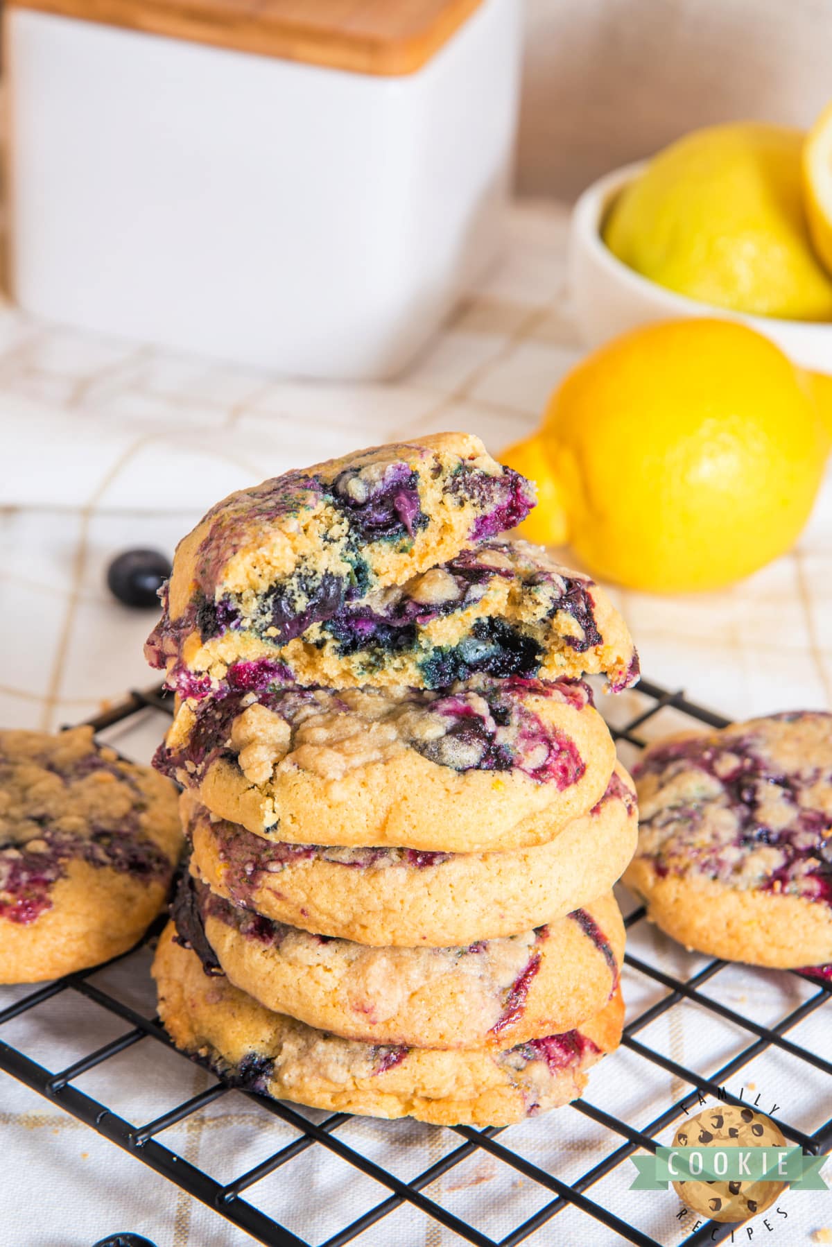 Stack of lemon cookies made with fresh blueberries.