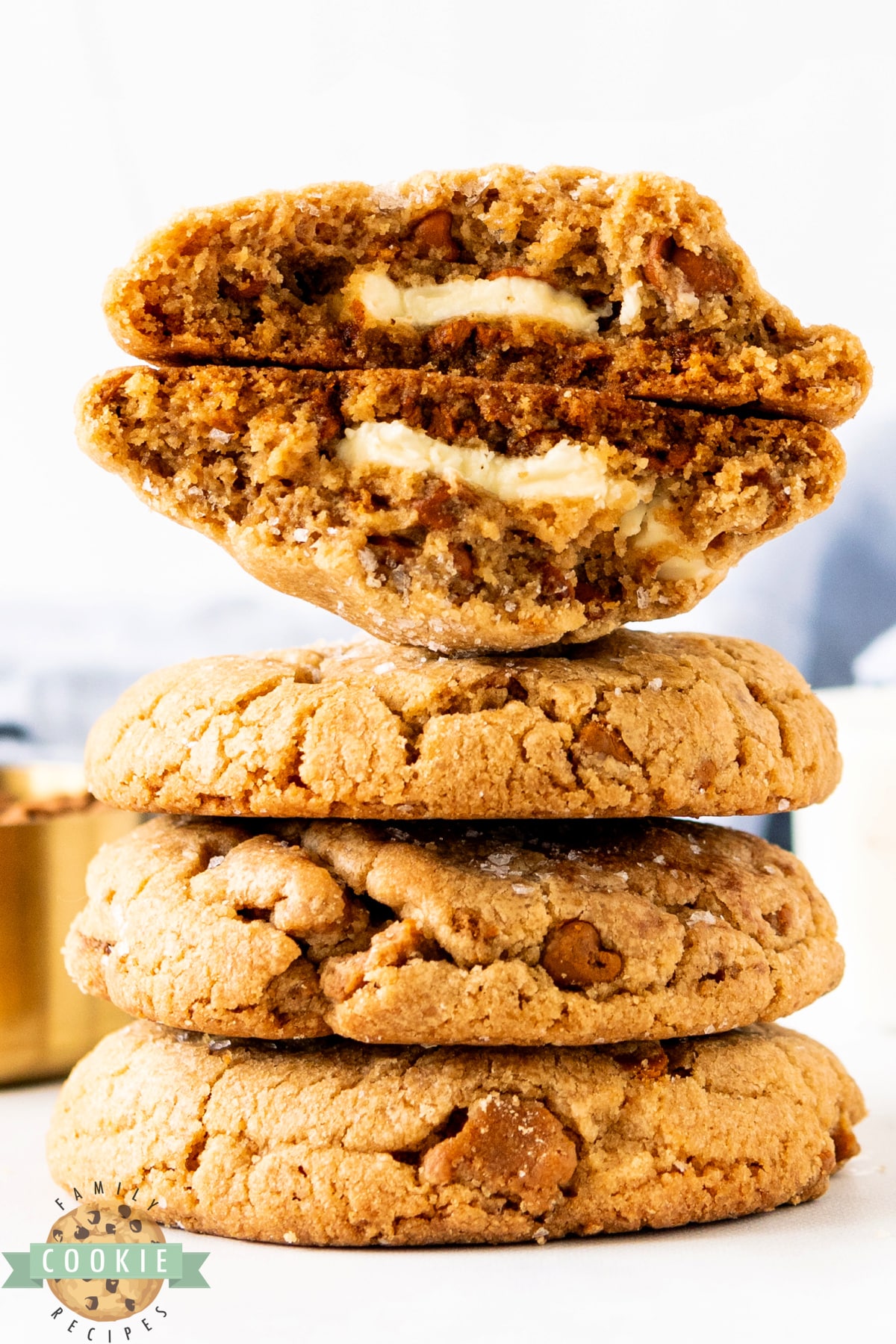 Biscoff Butter Cookies are made with rich cookie butter, crushed Biscoff cookies, cinnamon chips, and melted white chocolate in the center.