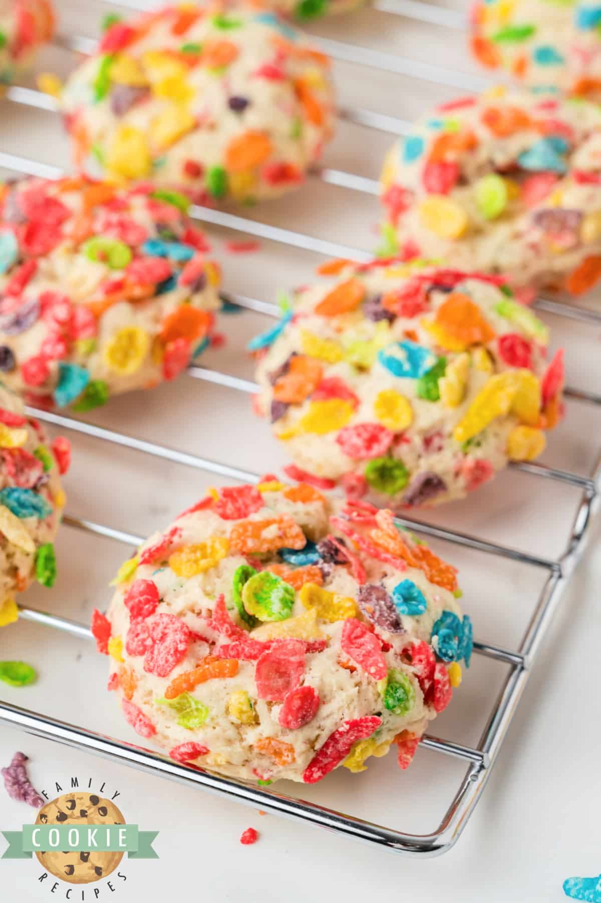 Cookies coated in Fruity Pebbles Cookies.