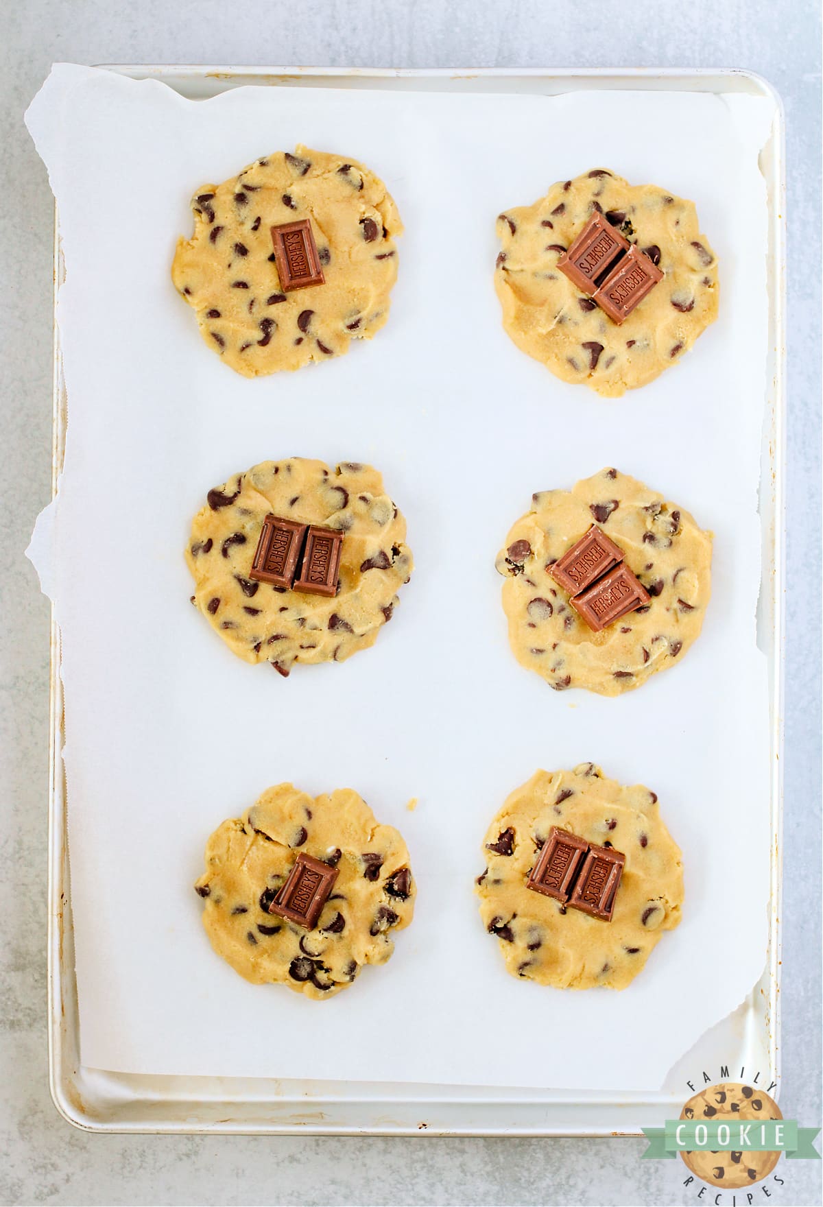 Add Hershey bars to cookie dough.