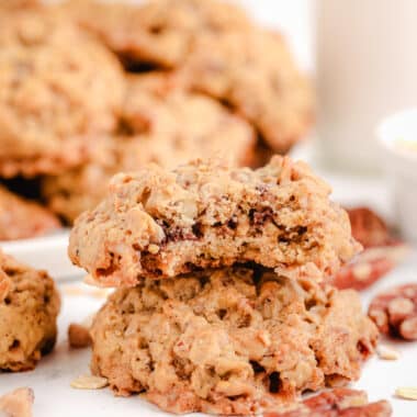 Oatmeal toffee pecan cookies with a bite taken out