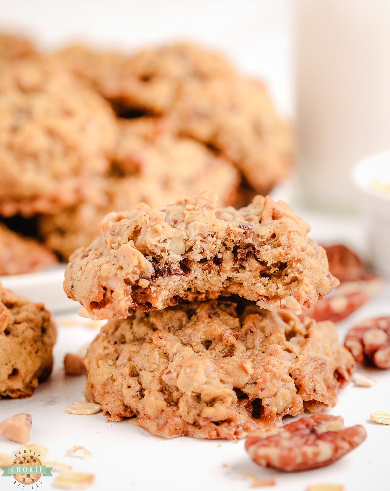 Oatmeal toffee pecan cookies with a bite taken out