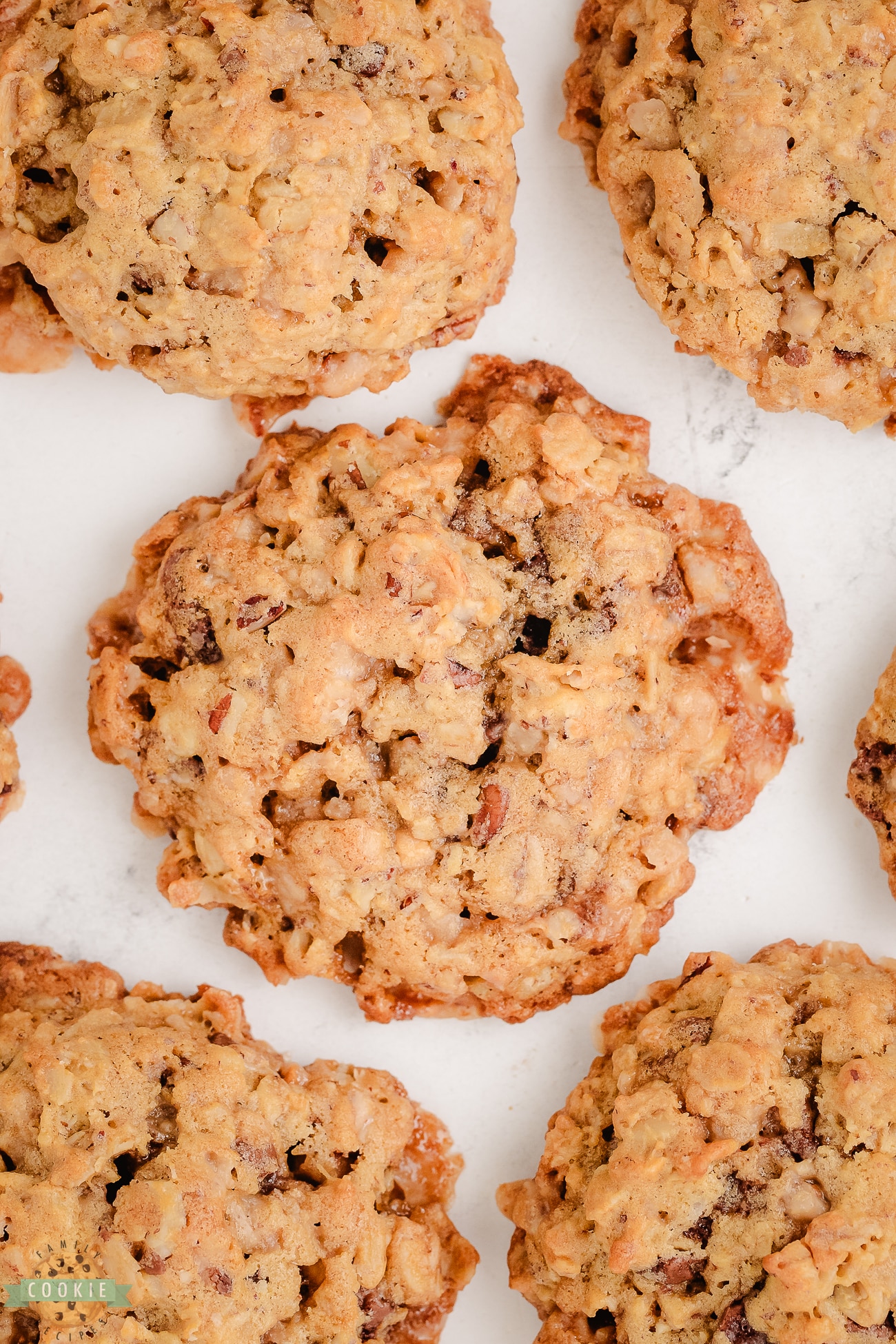 oatmeal toffee pecan cookies on a baking sheet