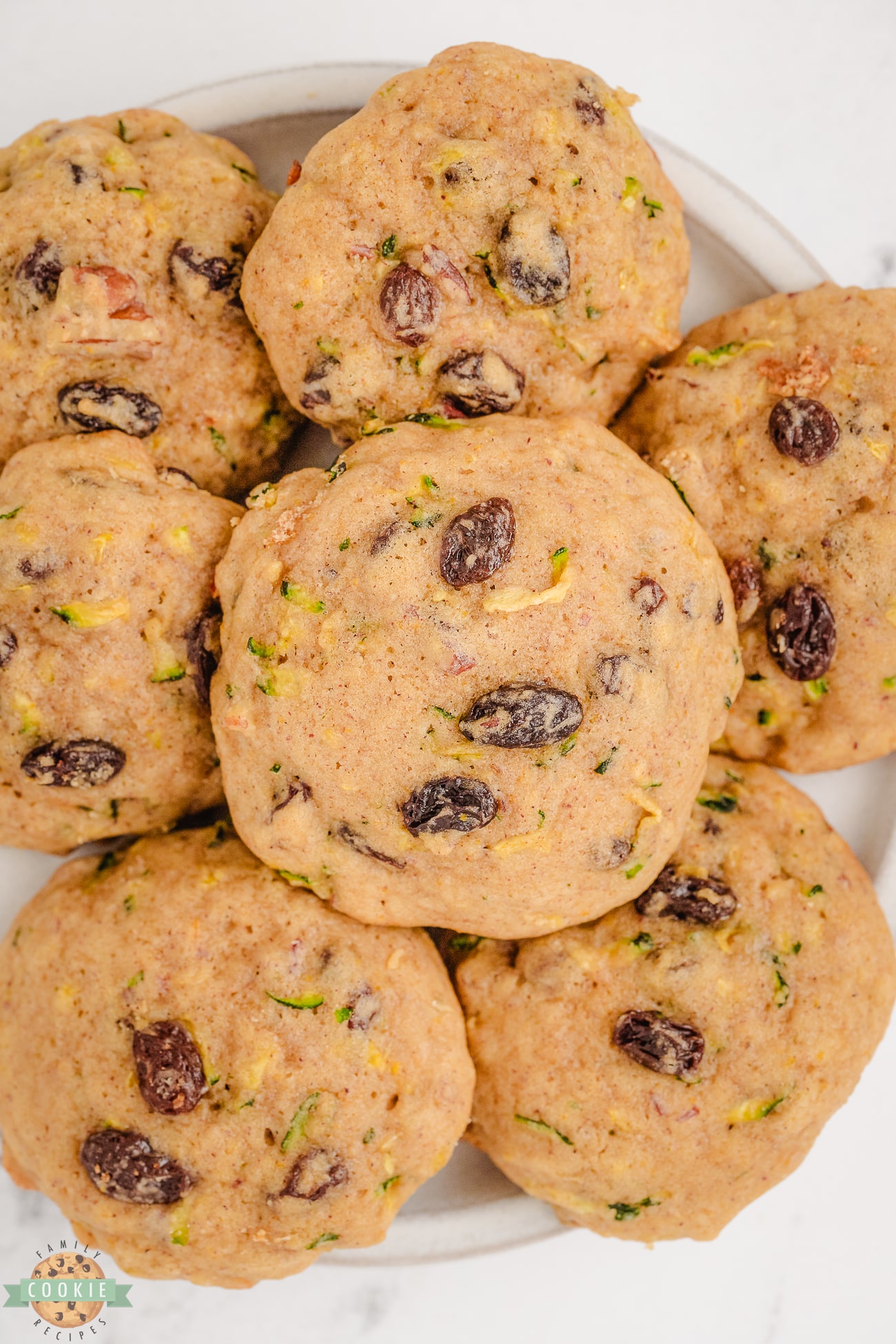 plateful of zucchini breakfast cookies with pecans and raisins