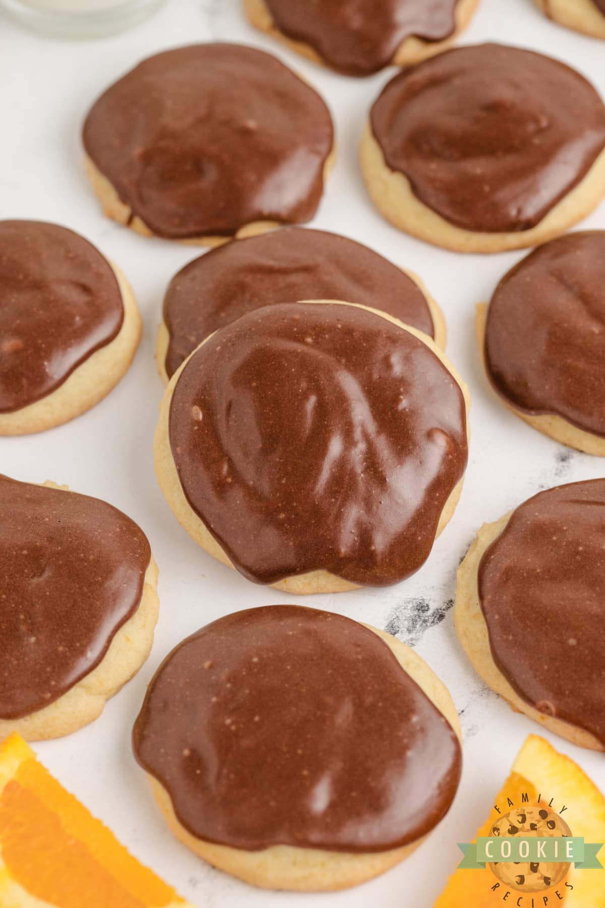 Thick orange cookies with fudge topping. 