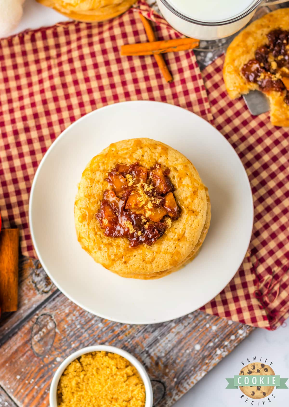 Spiced Apple Thumbprint Cookies are soft cinnamon cookies with gooey, spiced apples on top. Drizzle caramel on top and serve these delicious apple cookies with a scoop of vanilla ice cream!