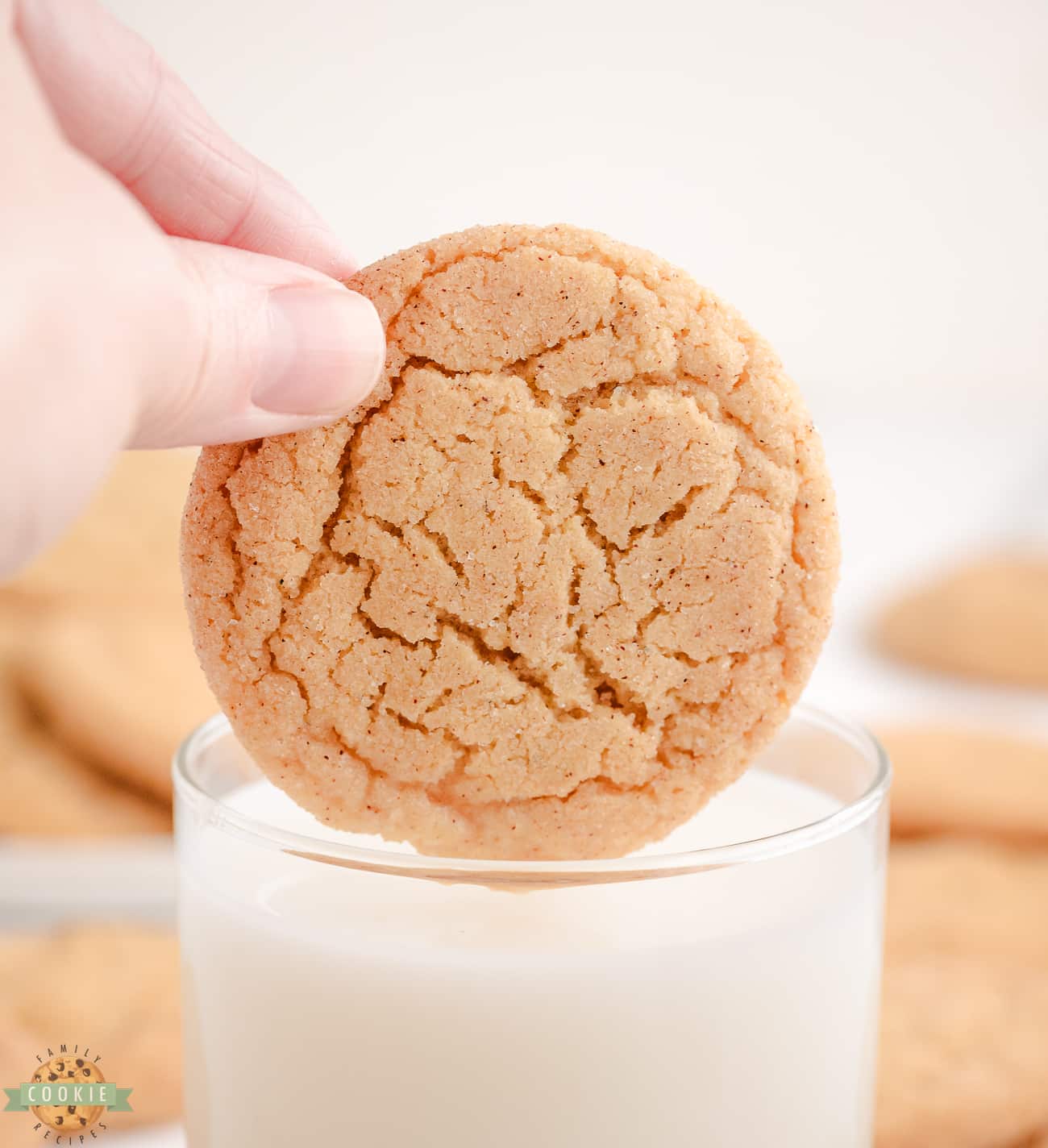 dunking a cardamom sugar cookie in milk